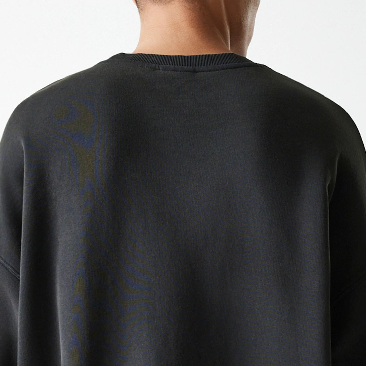 The Male model is wearing Milwaukee Bucks NBA Washed Graphic Grey Oversized Crew Neck Sweater 8