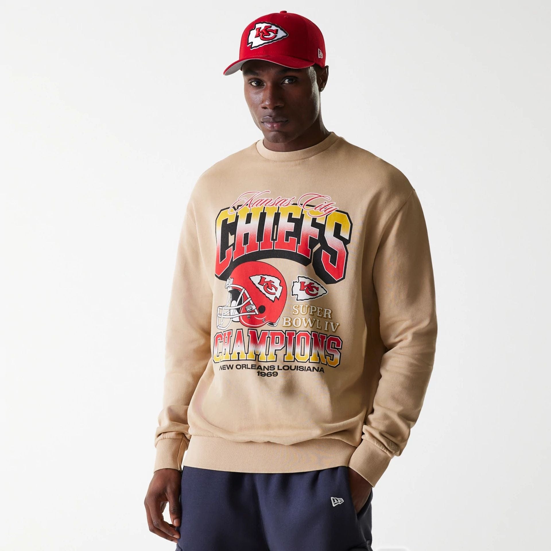 The Male model is wearing Kansas City Chiefs NFL Washed Super Bowl Beige Oversized Crew Neck Sweater 1
