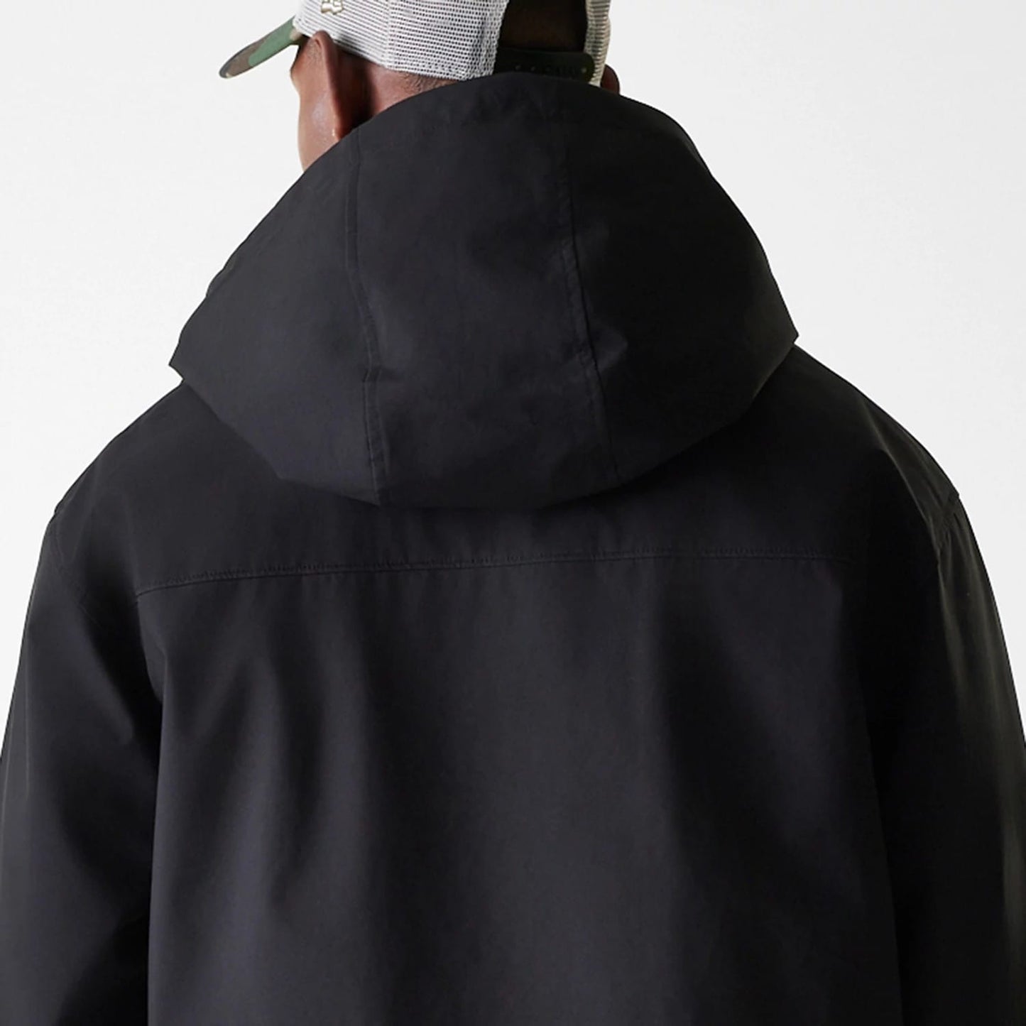 The Male model is wearing New Era Black Coach Jacket 7