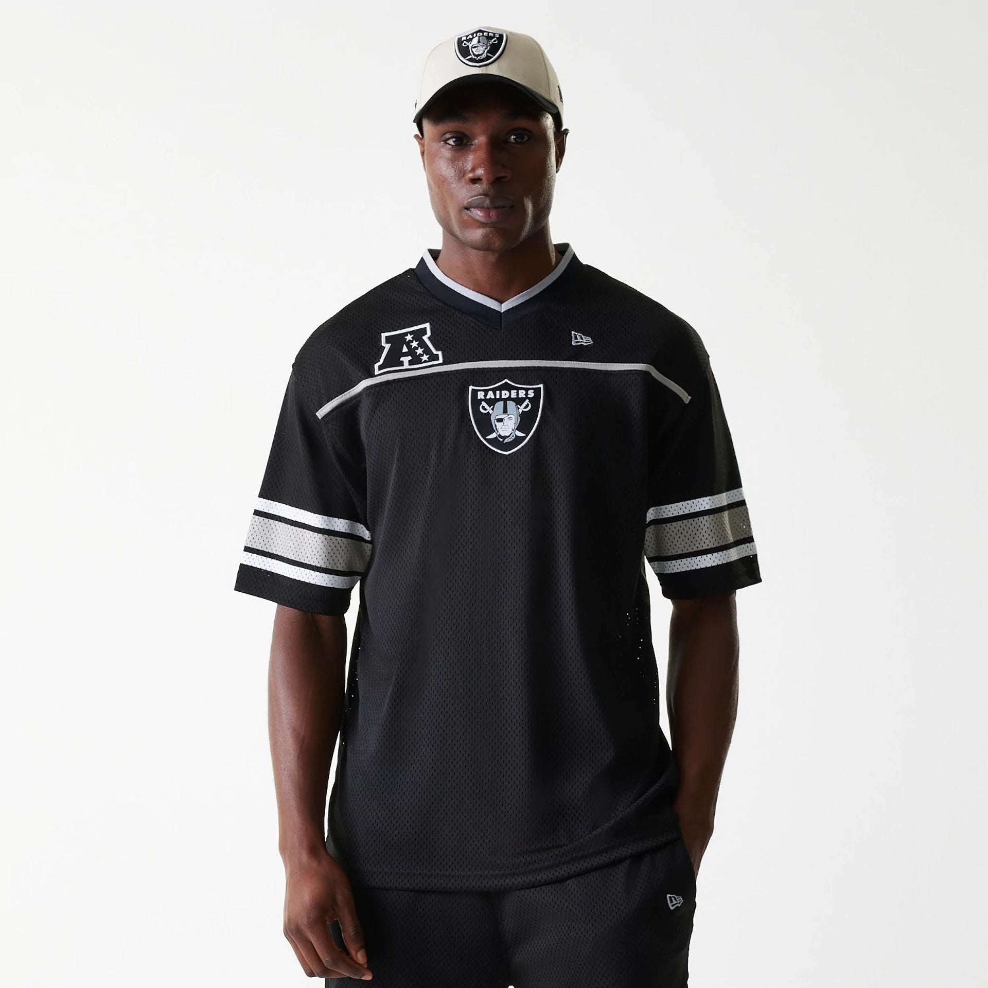 The Male model is wearing Las Vegas Raiders NFL Mesh Black Jersey 1