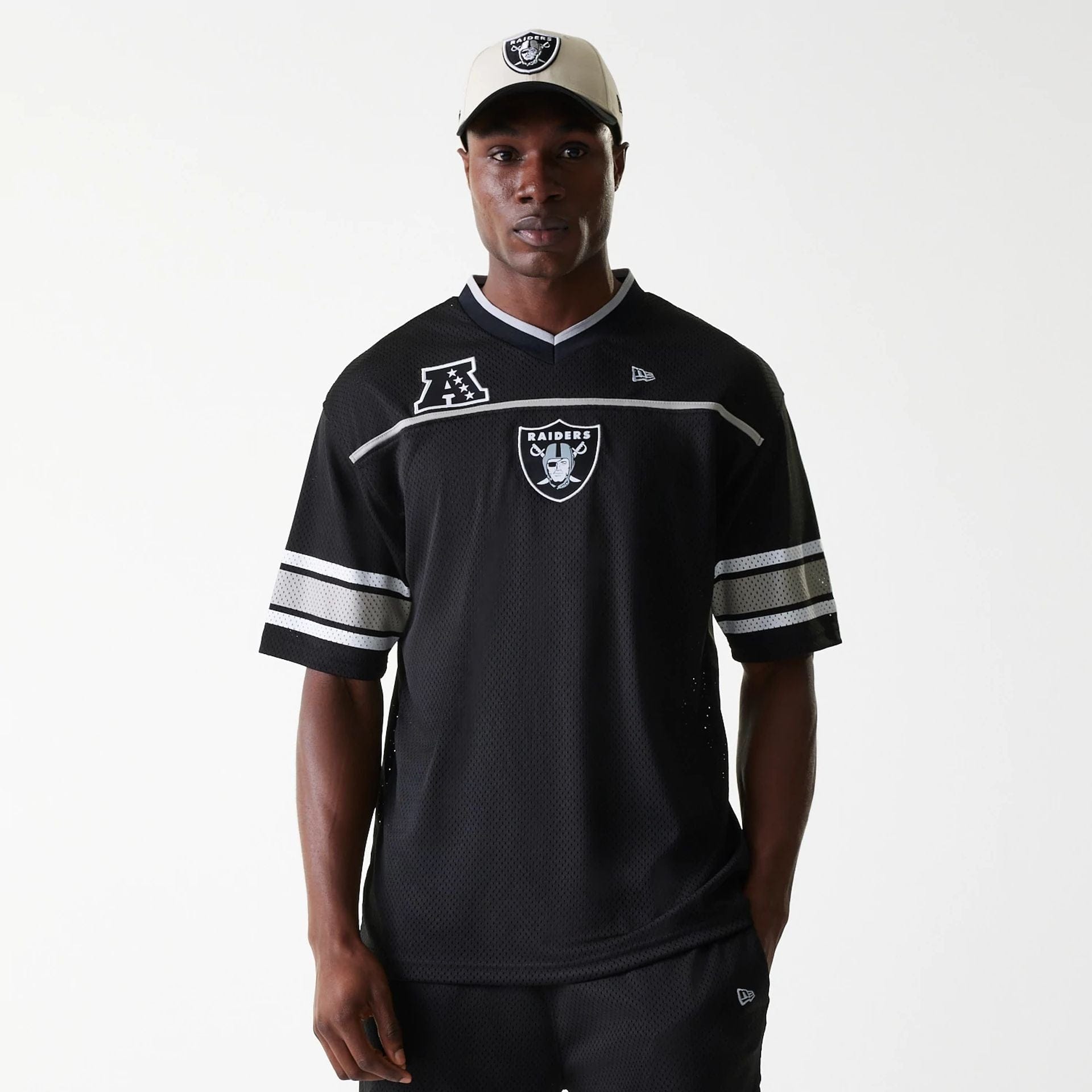 The Male model is wearing Las Vegas Raiders NFL Mesh Black Jersey 1