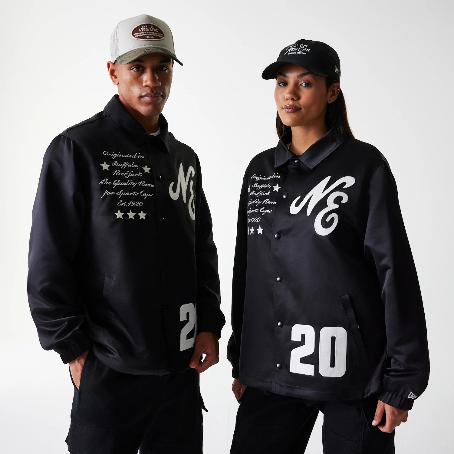 The Male model is wearing New Era Black Coaches Jacket 1