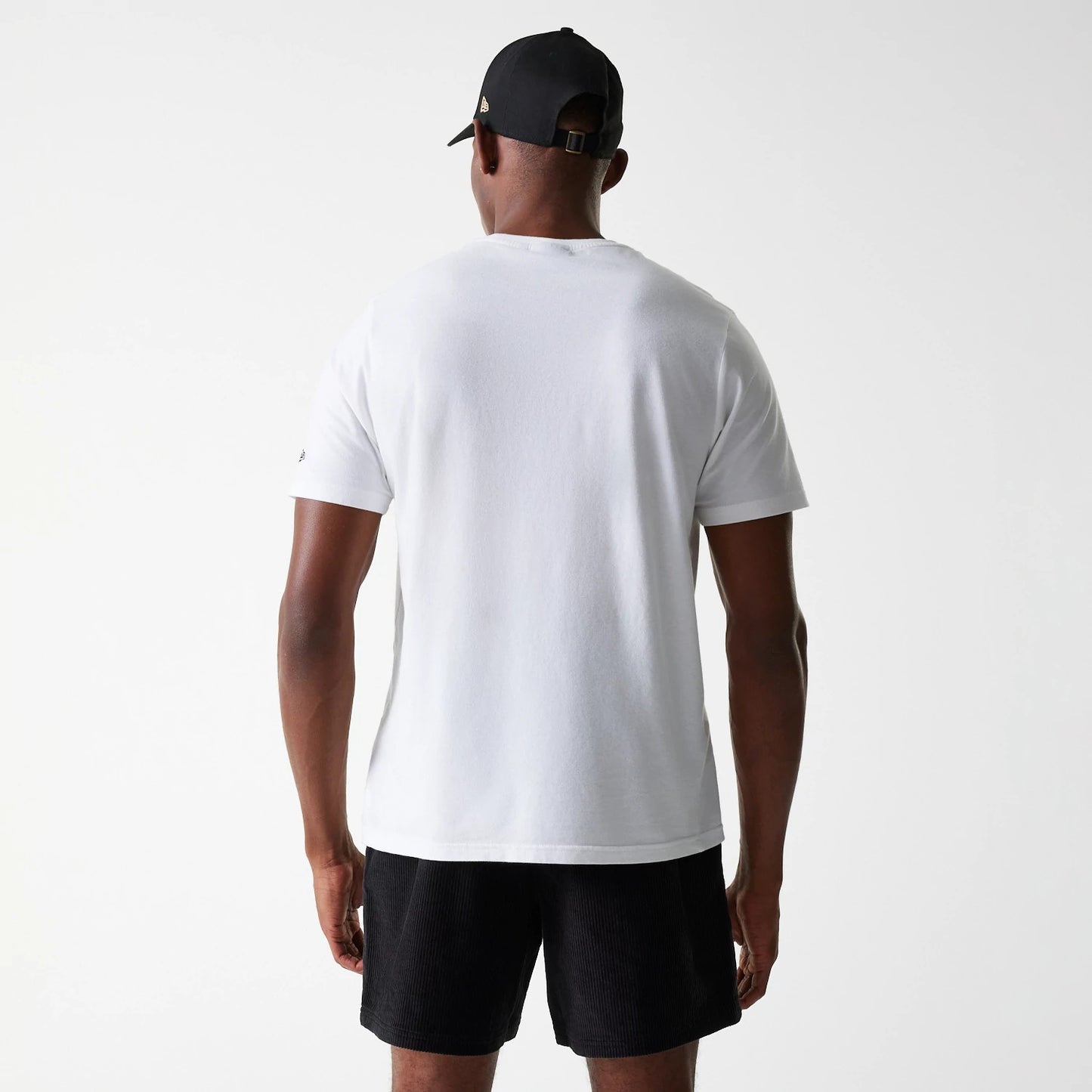 The Male model is wearing New Era Cord Black Shorts 5