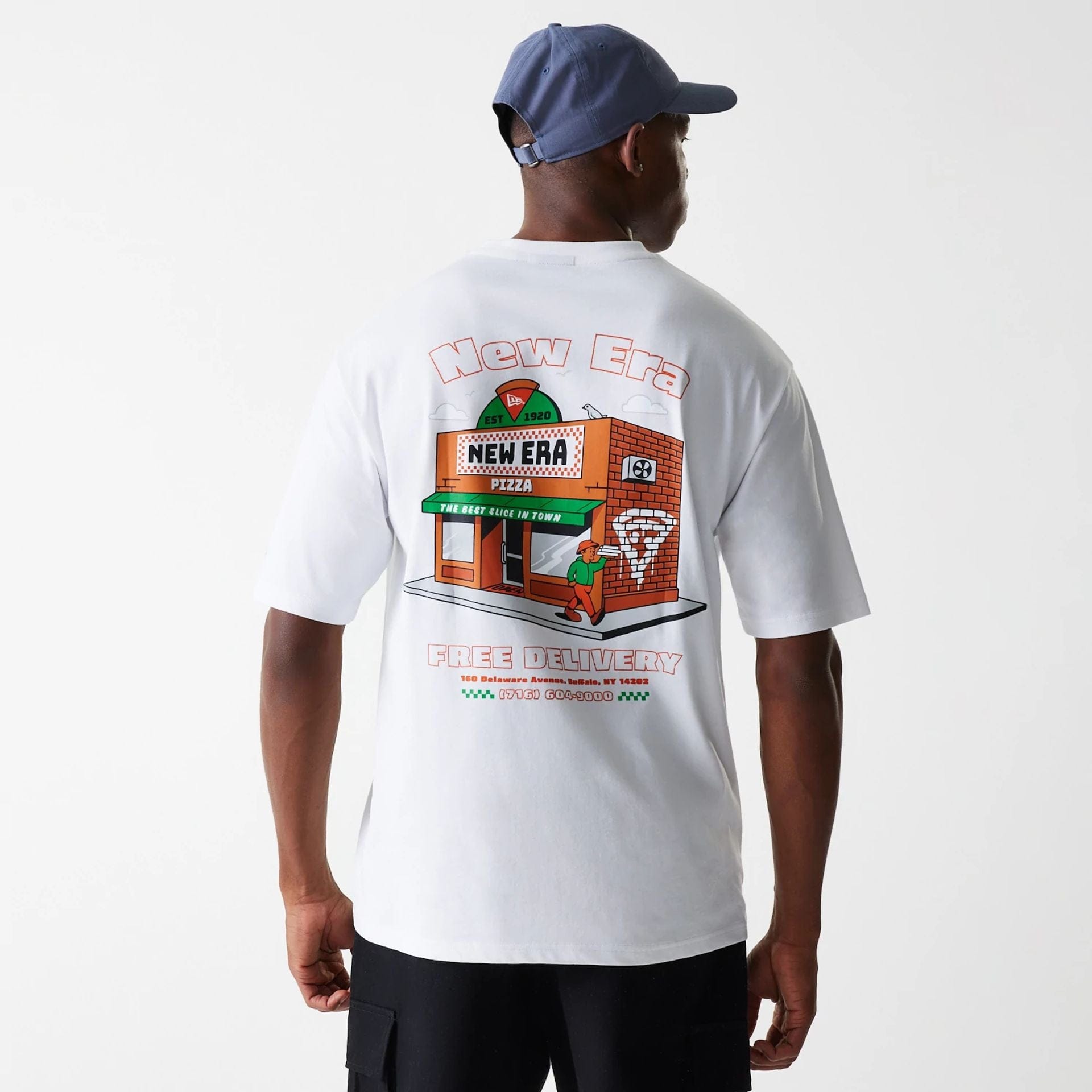 The Male model is wearing New Era Pizza Club Graphic White Oversized T-Shirt 2