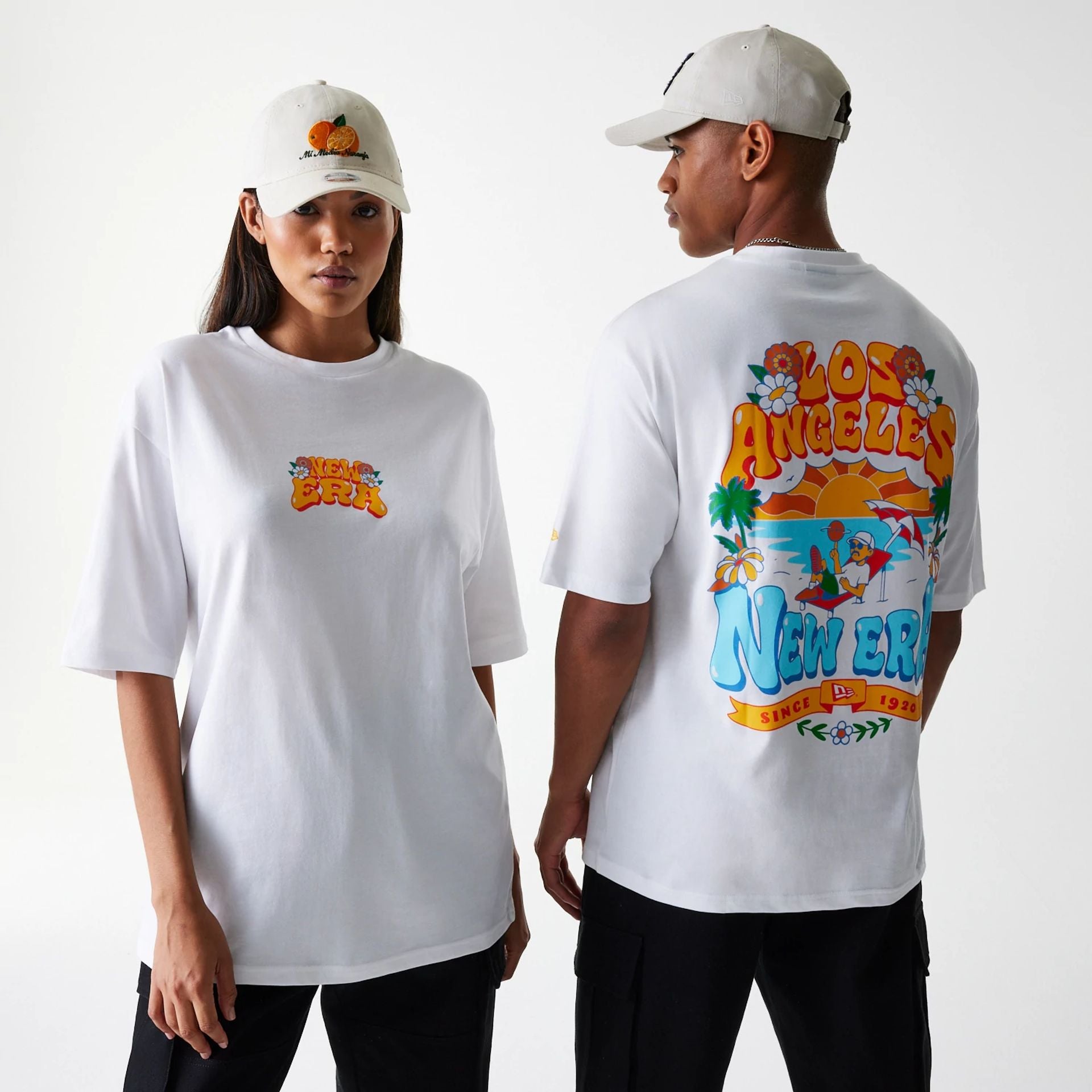 The Male model is wearing New Era Graphic White Oversized T-Shirt 1