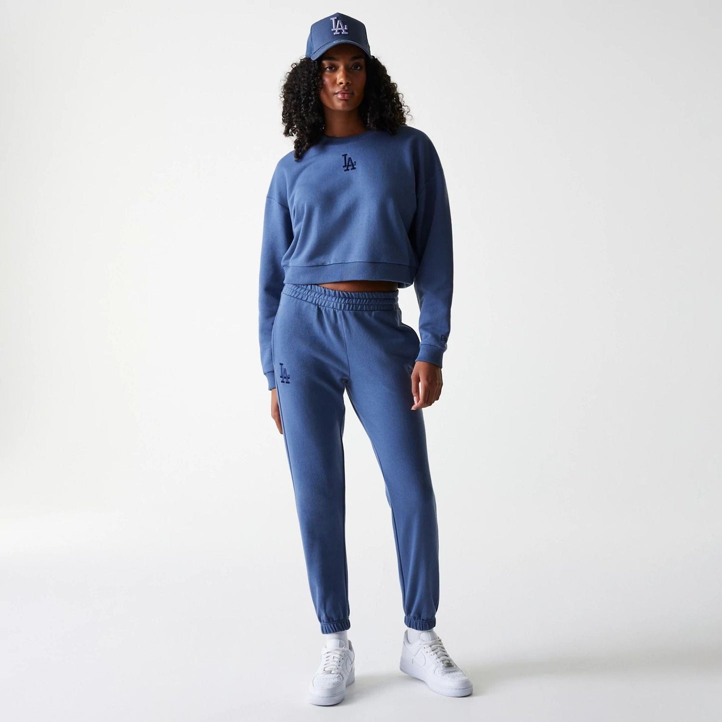 The Female model is wearing LA Dodgers Womens MLB Midi League Essential Dark Blue Joggers 8