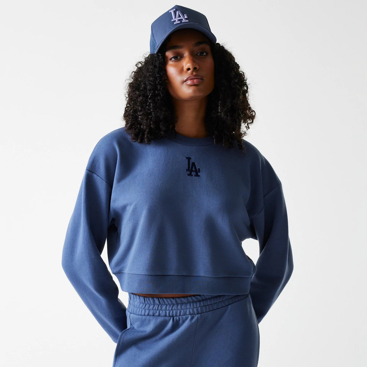 The Female model is wearing LA Dodgers Womens MLB Midi League Essential Dark Blue Cropped Crew Neck Sweater 1