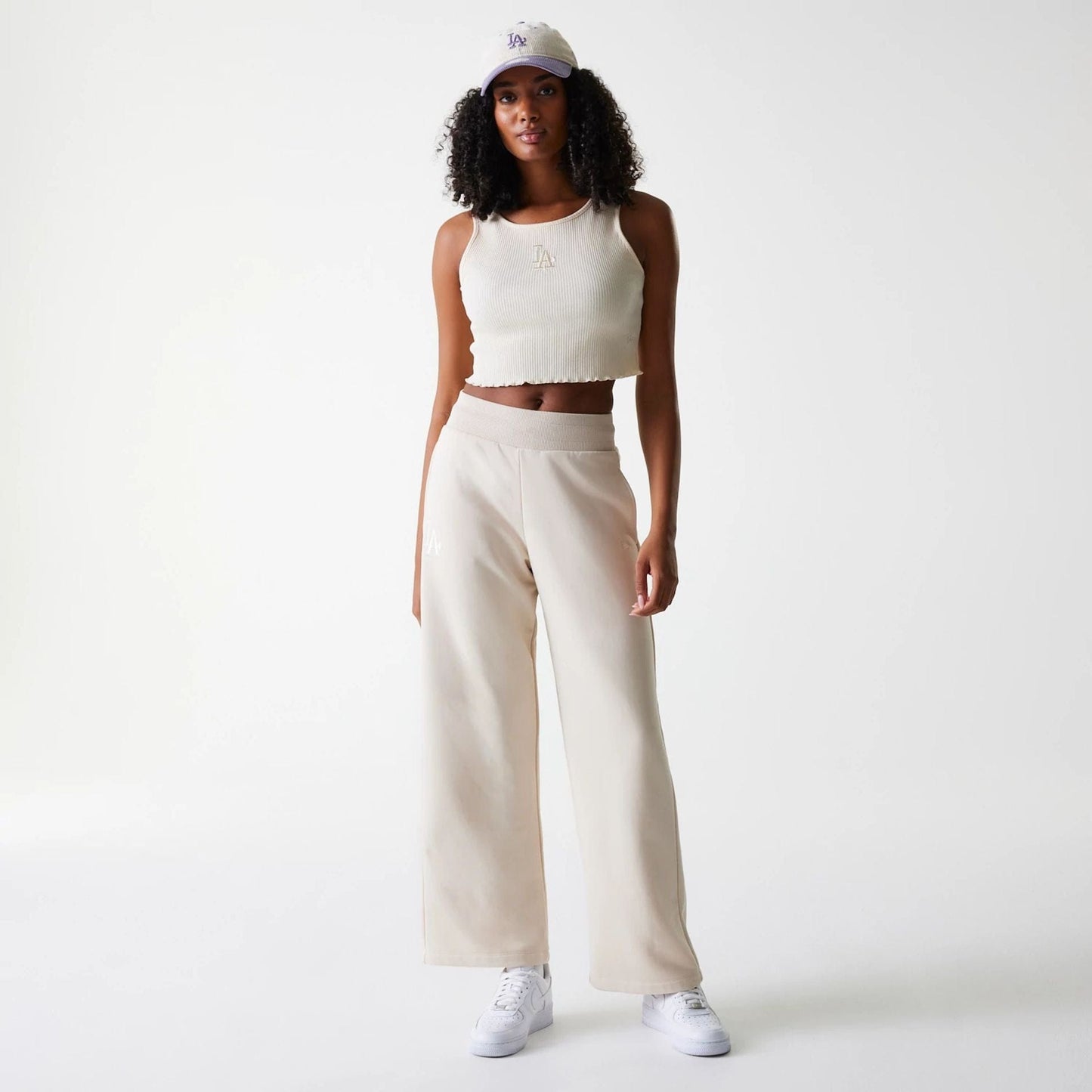 The Female model is wearing LA Dodgers Womens MLB Rib Light Beige Rib Tank Top 8