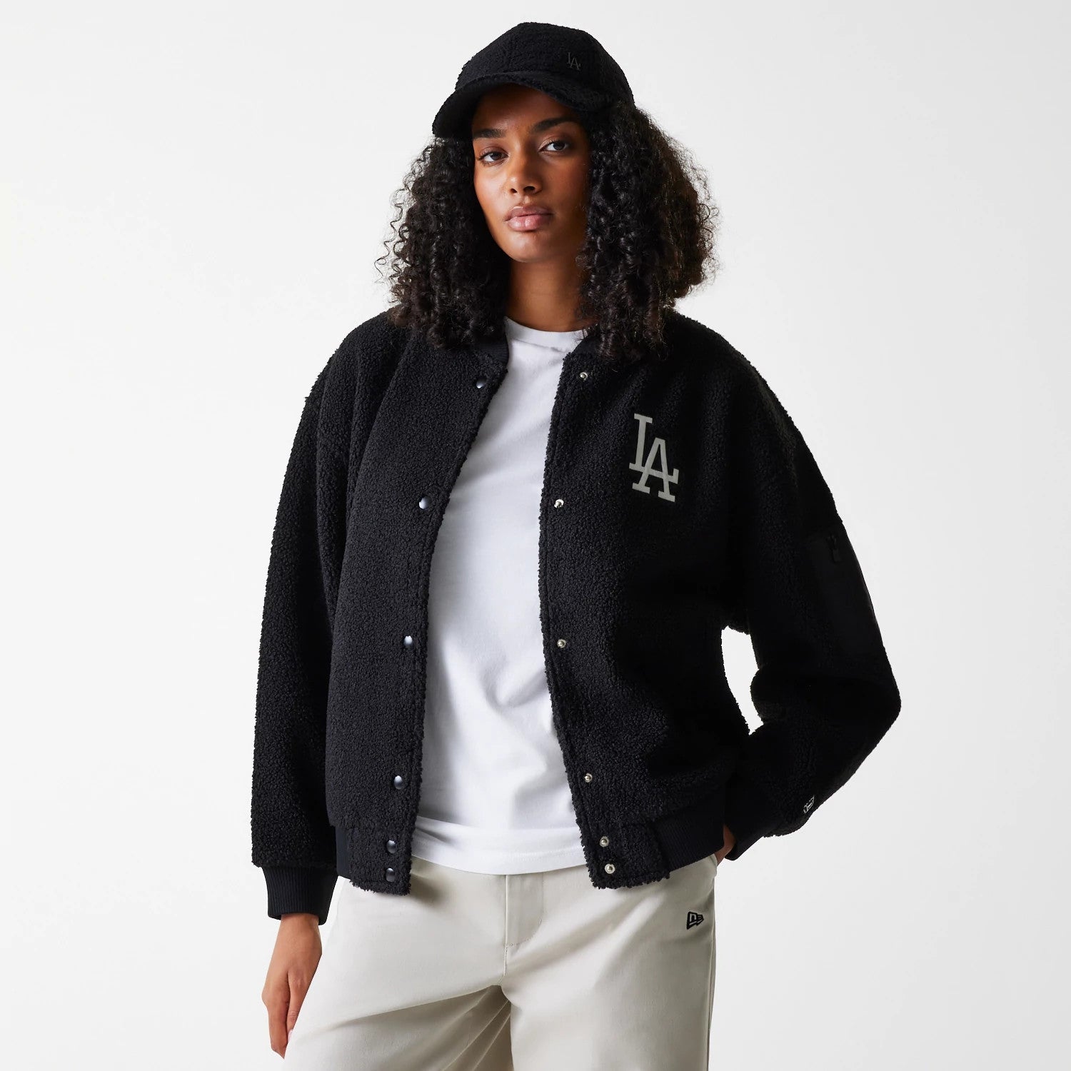 The Female model is wearing LA Dodgers Womens MLB Black Oversized Sherpa Bomber Jacket 2