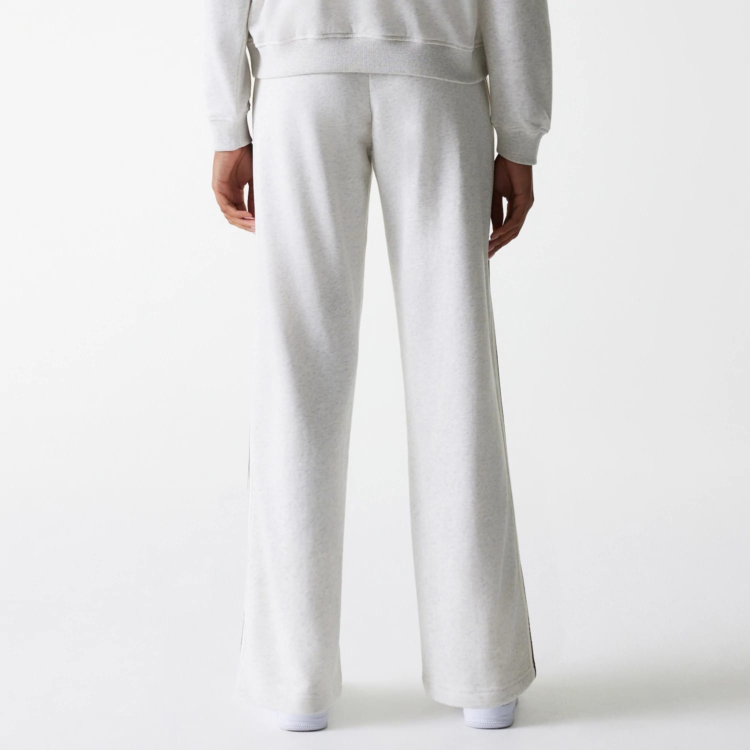 The Female model is wearing Womens New Era Pastel Grey Straight Leg Joggers 2
