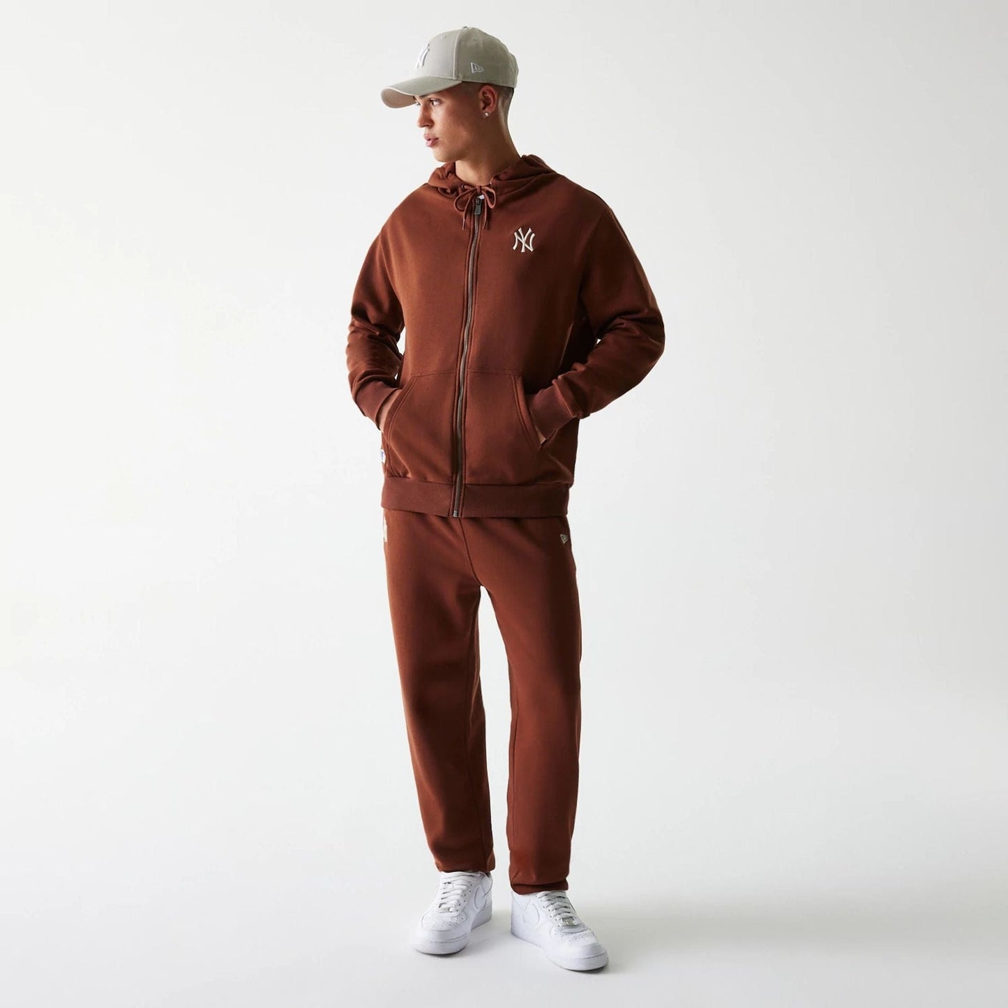 The Male model is wearing New York Yankees MLB Midi League Essential Brown Oversized Full Zip Hoodie 8