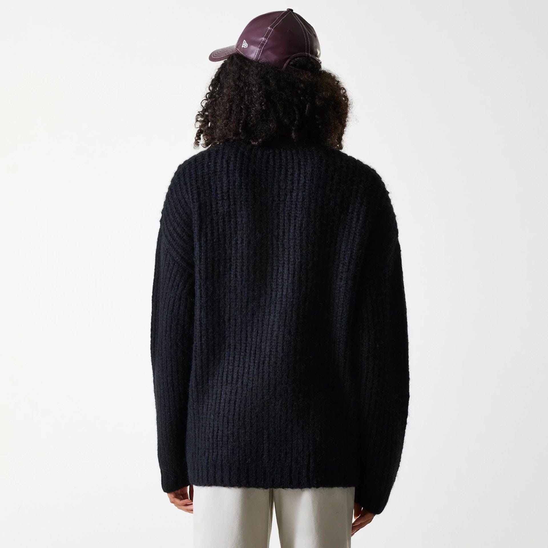The Female model is wearing New York Yankees Womens MLB Knit Black Cardigan 2