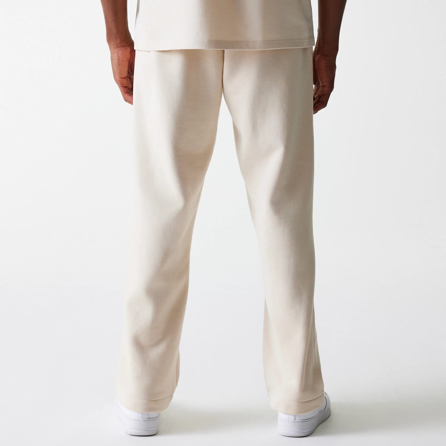 The Male model is wearing New Era Light Beige Straight Leg Joggers 2