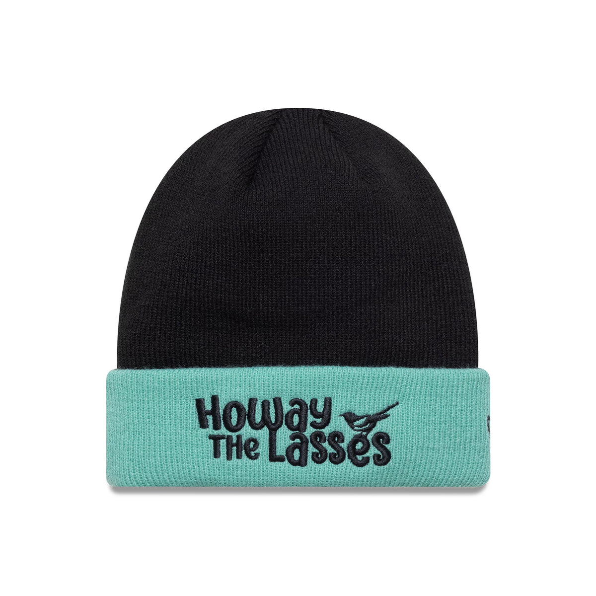 New Era Newcastle United FC Youth Lasses Script Black Cuff Knit Beanie Hat, front view showing HOWAY THE LASSES lettering embroidered in black on the teal cuff, with a small magpie graphic next to the text.
