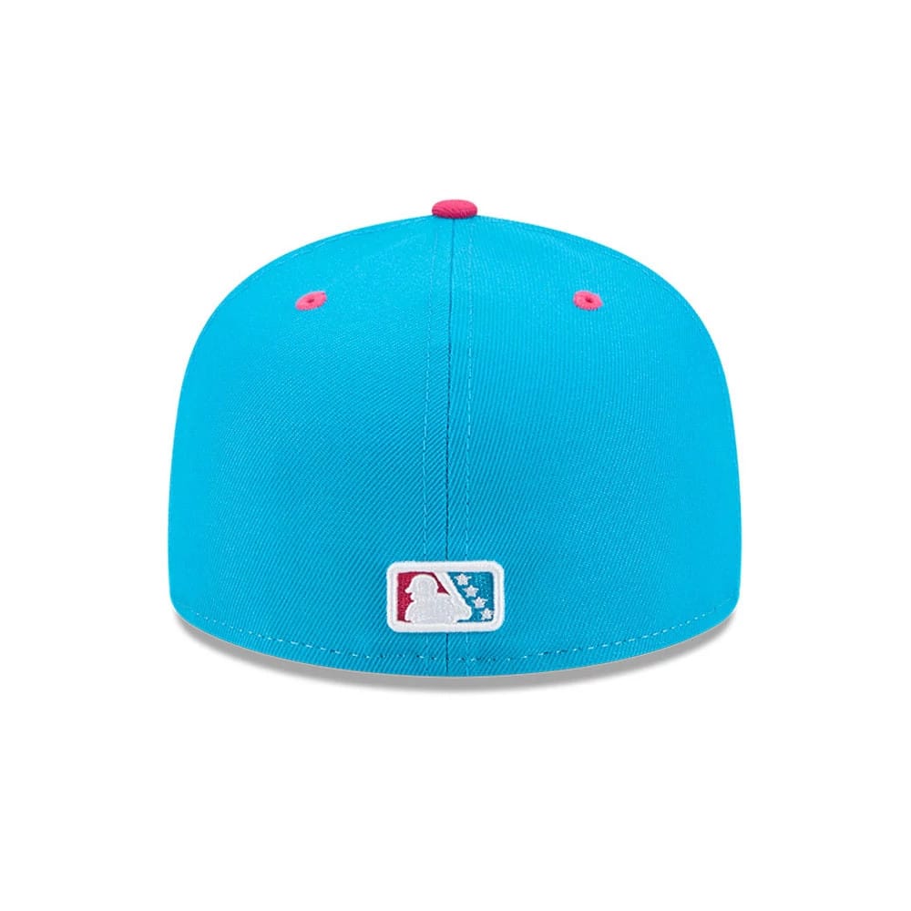 Somerset Patriots MiLB Theme Night Bright Blue New Era 59FIFTY Fitted Cap, rear view showing the white embroidered MLB Batterman logo at the centre back, with pink top button and eyelets on a structured bright blue crown.