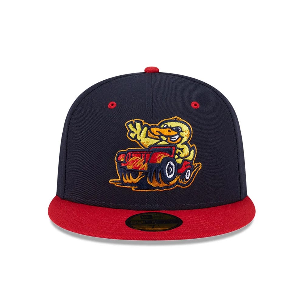 Toledo Mud Hens MiLB Theme Night Navy New Era 59FIFTY Fitted Cap, front view showing a yellow embroidered mascot driving a red vehicle on the navy crown, with a contrasting red visor and gold 59FIFTY size sticker.
