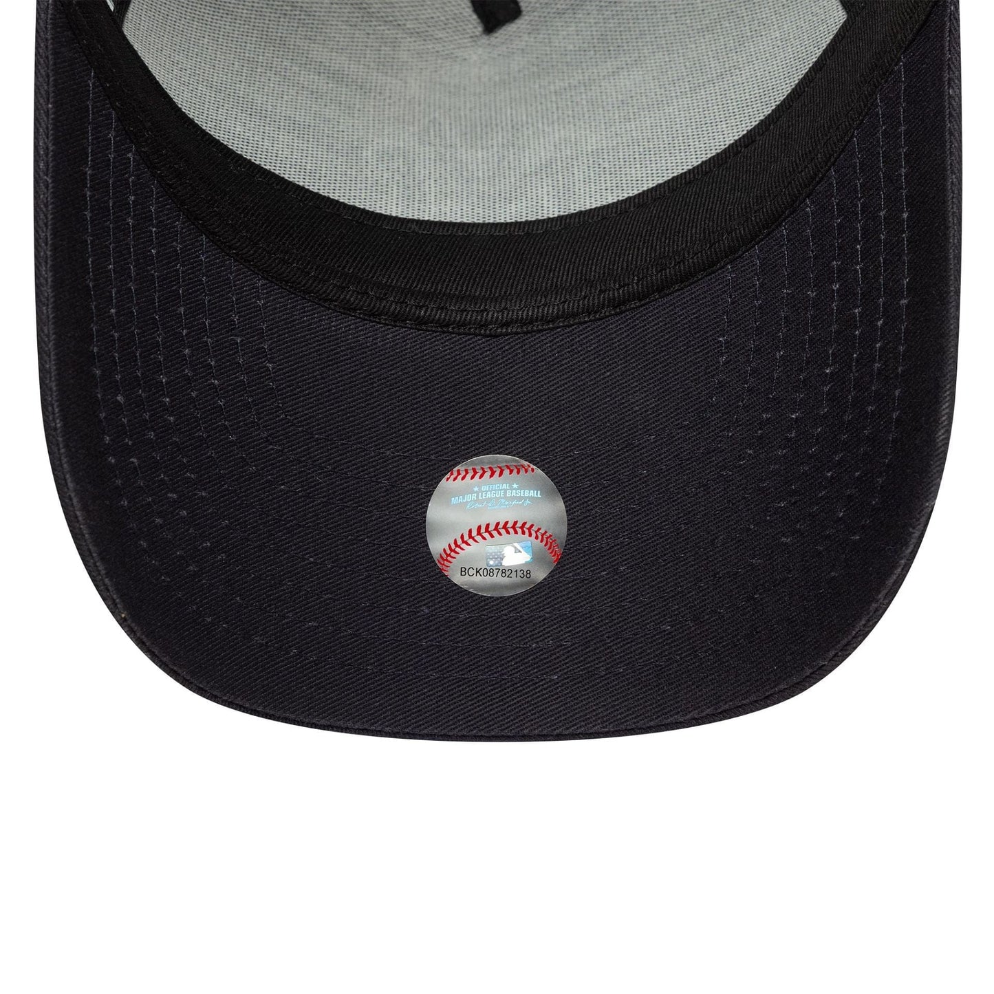 This is a New York Yankees MLB Outline Navy 9FORTY E-Frame Trucker Adjustable Cap 5