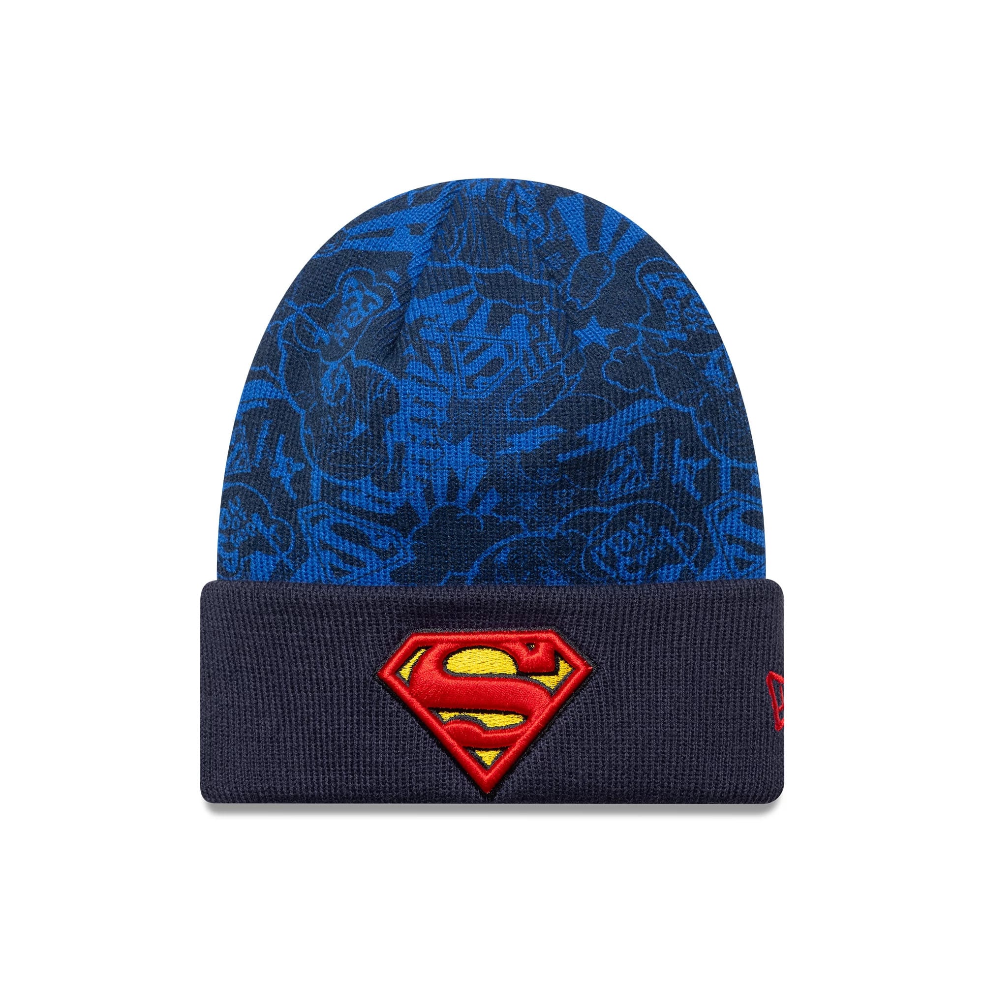 New Era Superman Youth DC Blue Cuff Knit Beanie Hat, front view showing a red and yellow embroidered Superman logo centred on the cuff with a tonal blue graphic pattern on the crown and a small red emblem on the left side.
