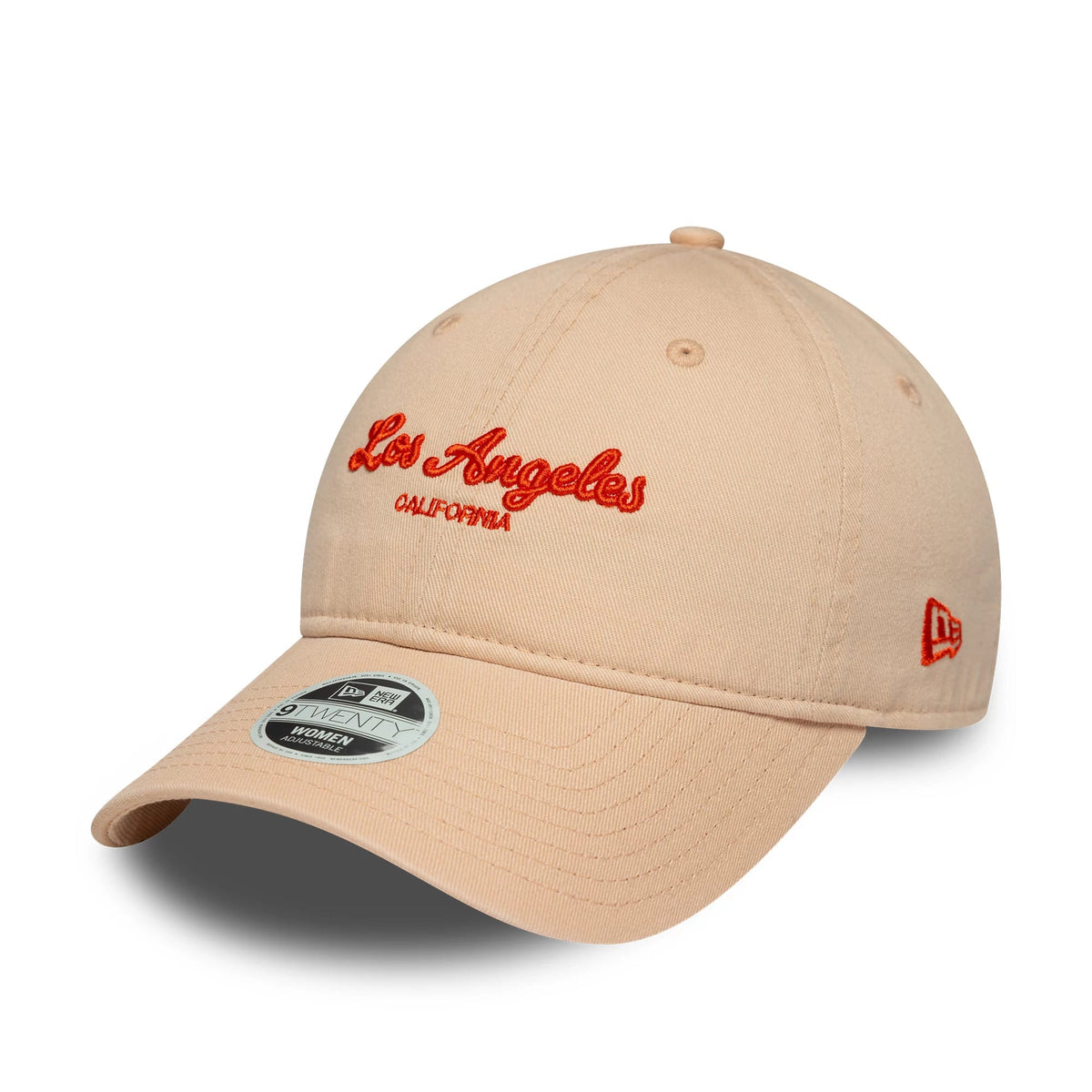 Womens New Era City Pastel Pink 9TWENTY Adjustable Cap, three-quarter view showing raised red Los Angeles embroidery on the front panel, a curved visor with a 9TWENTY size sticker, and the New Era flag logo on the left side.