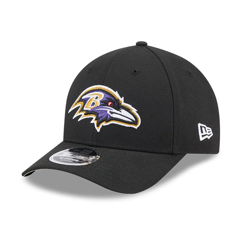 Baltimore Ravens NFL Team Black New Era 9FORTY M-Crown Cap, three-quarter view showing the raised embroidered team logo on the front panel, New Era flag logo on the left side, and 9FORTY size sticker on the curved visor.