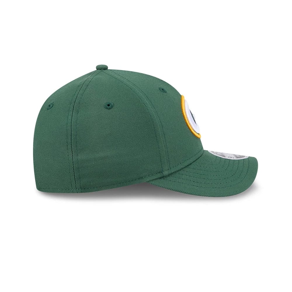 Green Bay Packers NFL Team Dark Green New Era 9FORTY M-Crown Cap, side view showing the white and yellow embroidered Packers logo on the front panel, the curved visor with a 9FORTY size sticker, and the green structured crown.