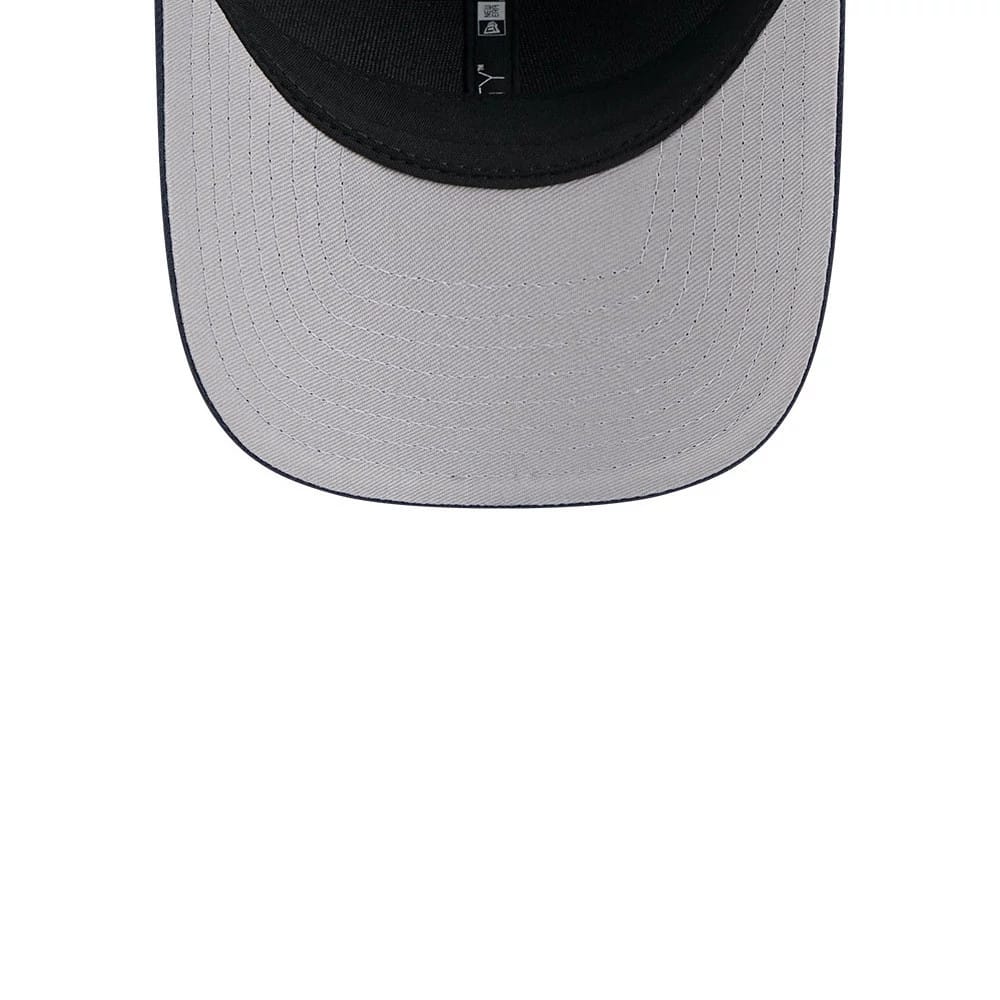 Chicago Bears NFL Team Navy New Era 9FORTY M-Crown Cap, inside view showing the black undervisor and sweatband with a black inner taping strip, highlighting the structure of the visor from beneath.