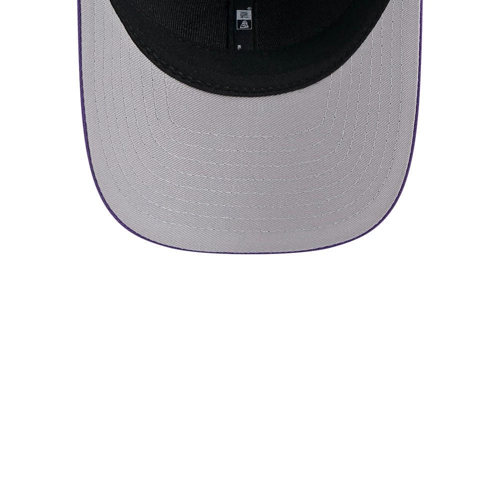 Minnesota Vikings NFL Team Purple New Era 9FORTY M-Crown Cap, inside view showing the grey undervisor, dark sweatband and centre seam taping, with a small black and white label attached.