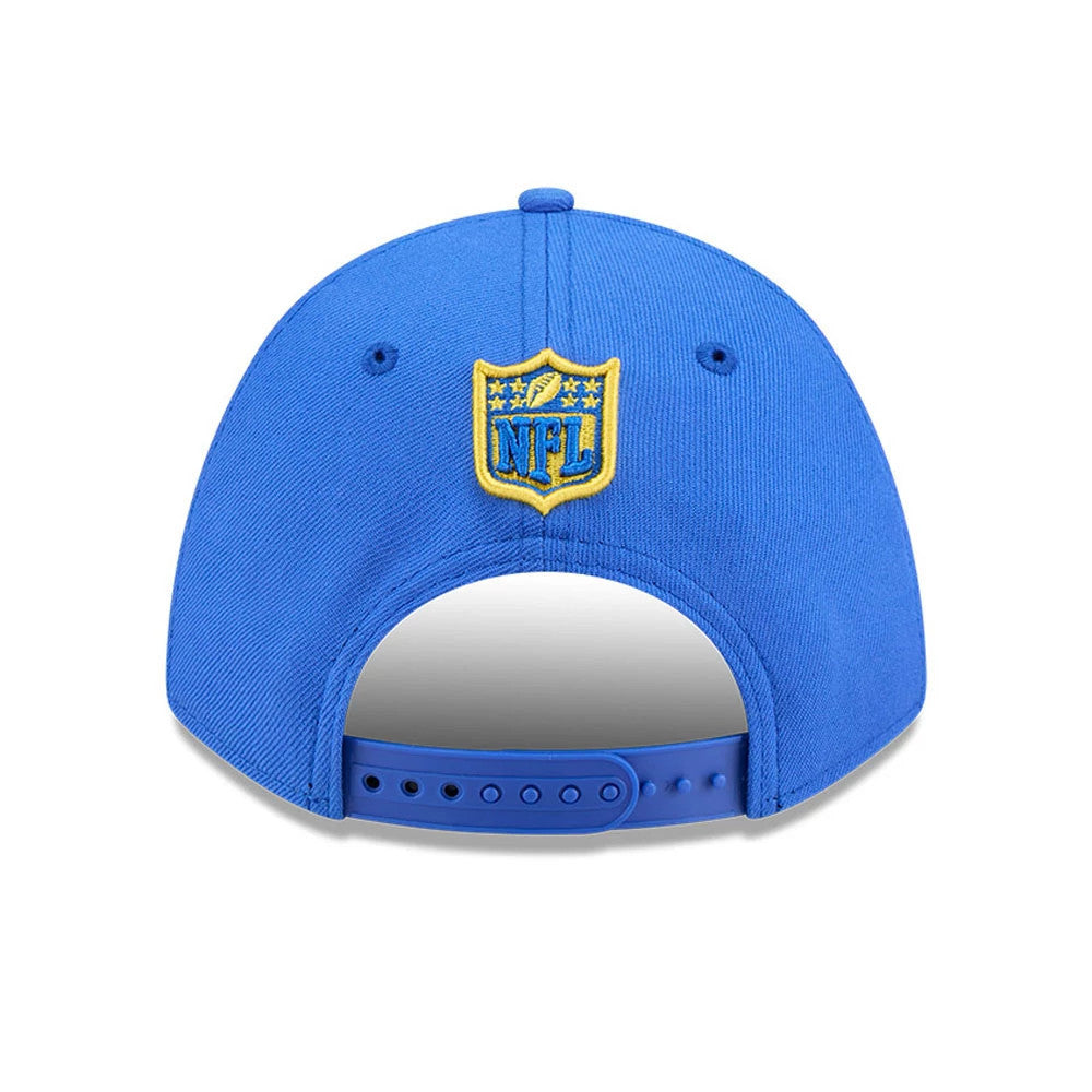 LA Rams NFL Team Bright Blue New Era 9FORTY M-Crown Cap, rear view showing the yellow and blue embroidered NFL shield logo centred above the adjustable snapback closure on the structured bright blue crown.