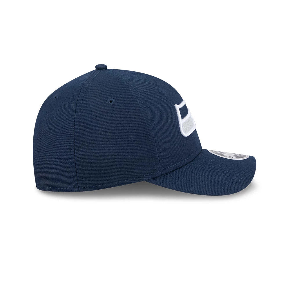 Seattle Seahawks NFL Team Dark Blue New Era 9FORTY M-Crown Cap, side view showing raised white and dark blue embroidered Seahawks logo on the front panel, with a curved visor featuring a 9FORTY size sticker and matching dark blue crown.
