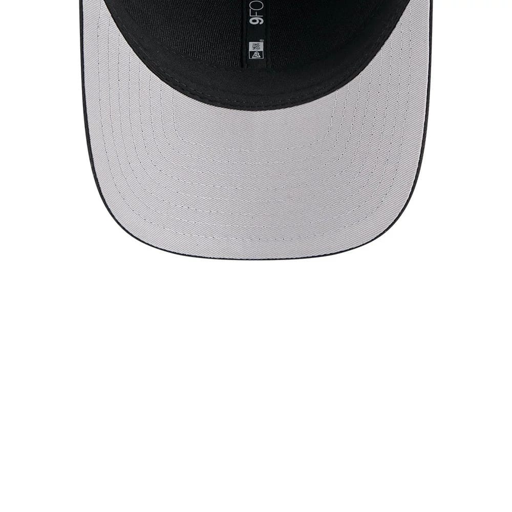 Arizona Cardinals NFL Team Black New Era 9FORTY M-Crown Cap, inside view showing the black undervisor, white taping with a 9FORTY size sticker, and a printed graphic at the centre.