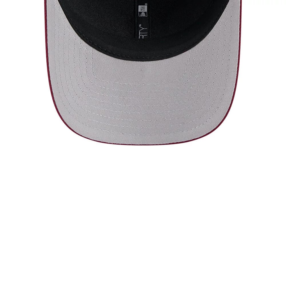 Washington Commanders NFL Team Dark Red New Era 9FORTY M-Crown Cap, inside view showing the black sweatband, grey undervisor with fine stitching, and the 9FORTY size sticker on the underside of the visor.