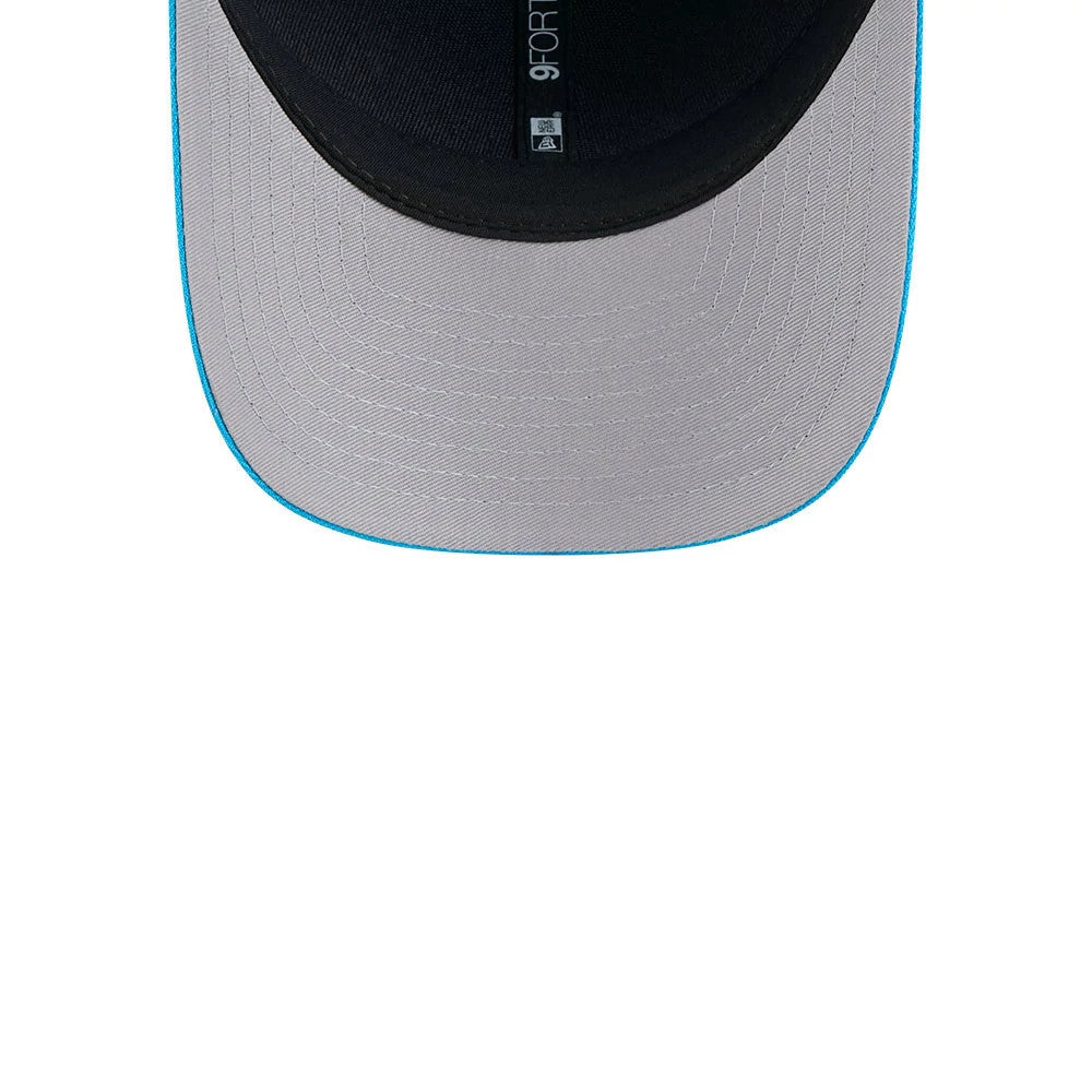 Carolina Panthers NFL Team Blue New Era 9FORTY M-Crown Cap, inside view showing the black sweatband with 9FORTY branding on grey taping and a grey undervisor featuring a light blue edge.