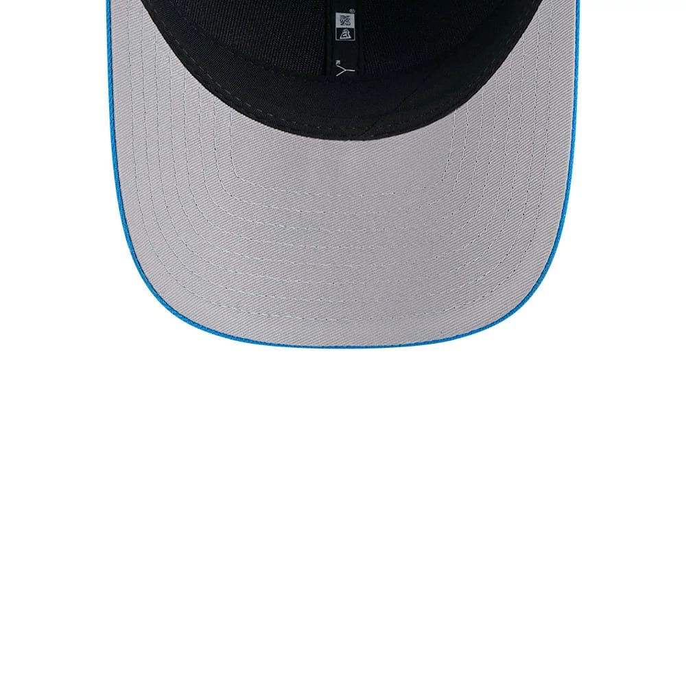 Detroit Lions NFL Team Blue New Era 9FORTY M-Crown Cap, inside view showing the grey undervisor with blue edge trim and black sweatband, featuring interior taping and a size sticker on the underside of the visor.