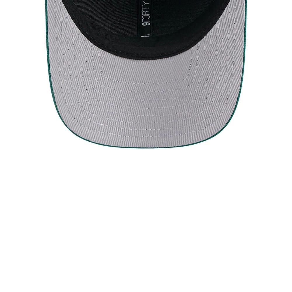 New York Jets NFL Team Green New Era 9FORTY M-Crown Cap, inside view showing the black sweatband, grey undervisor with green edge detail, and the 9FORTY size sticker on the underside of the visor.