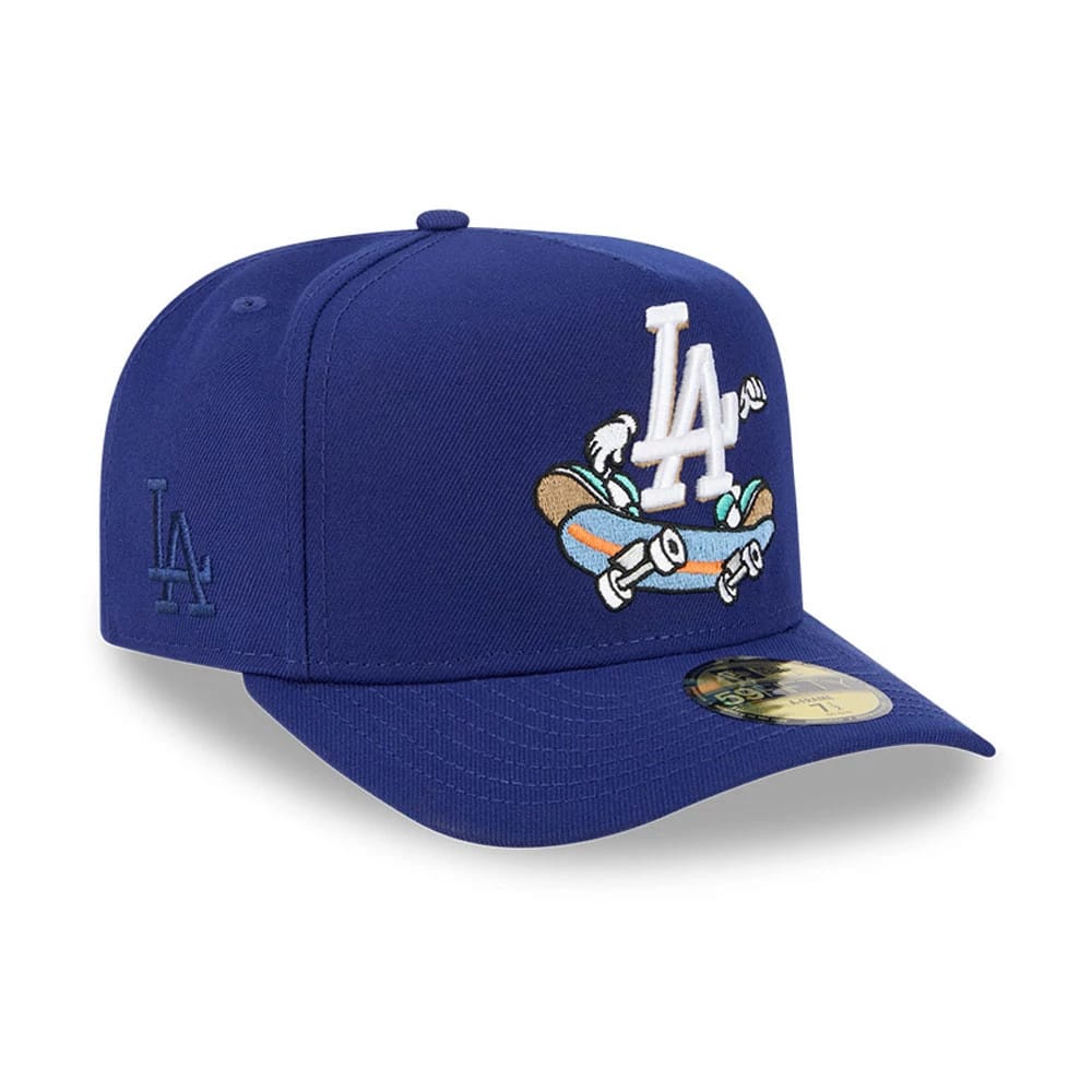 LA Dodgers MLB Cartoon Dark Blue New Era 59FIFTY A-Frame Fitted Cap, three-quarter view with a white embroidered LA logo and cartoon skater on the front panel, dark blue structured crown, and gold 59FIFTY size sticker on the visor.