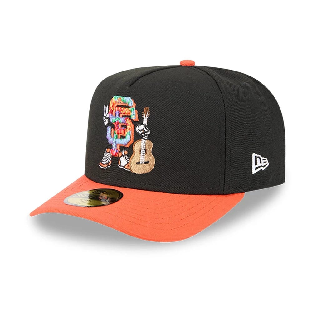 San Francisco Giants MLB Cartoon Black New Era 59FIFTY A-Frame Fitted Cap, three-quarter view showing a colourful cartoon graphic on the front panel with an orange visor and New Era flag logo on the left side, with a gold 59FIFTY size sticker.