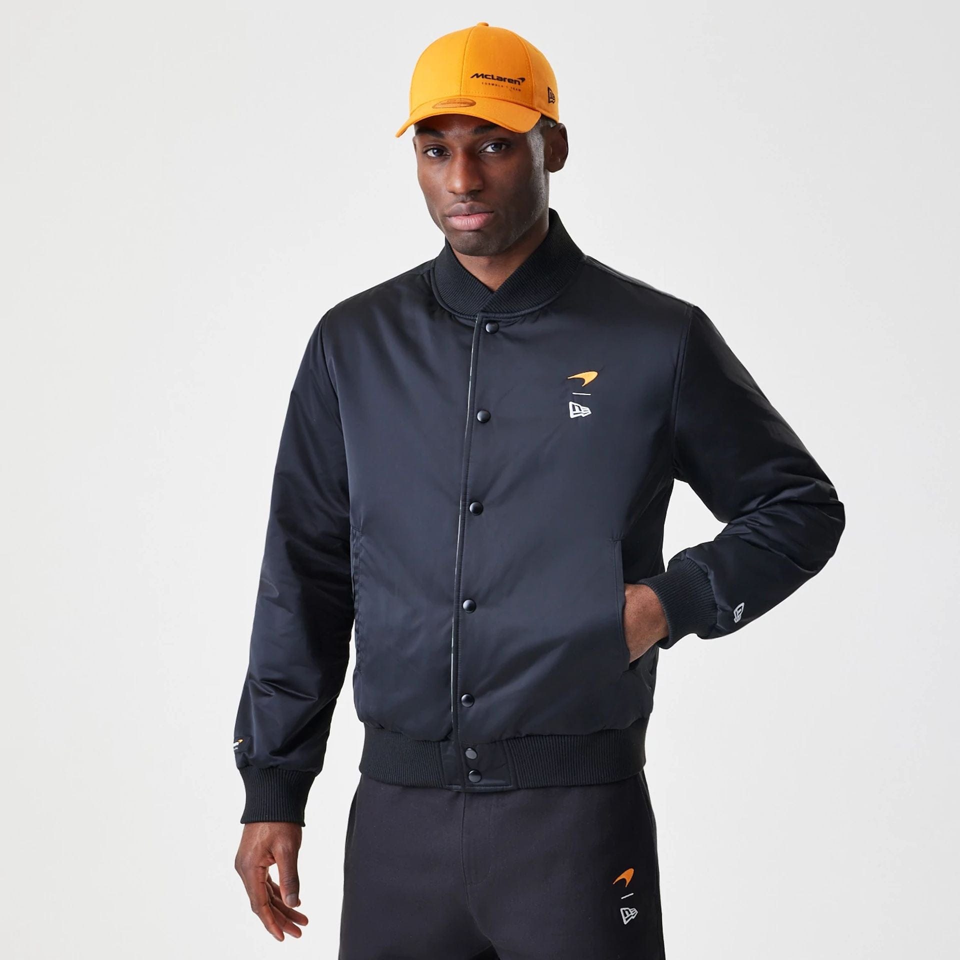 The Male model is wearing McLaren Racing McLaren Black Reversible Bomber Jacket 1