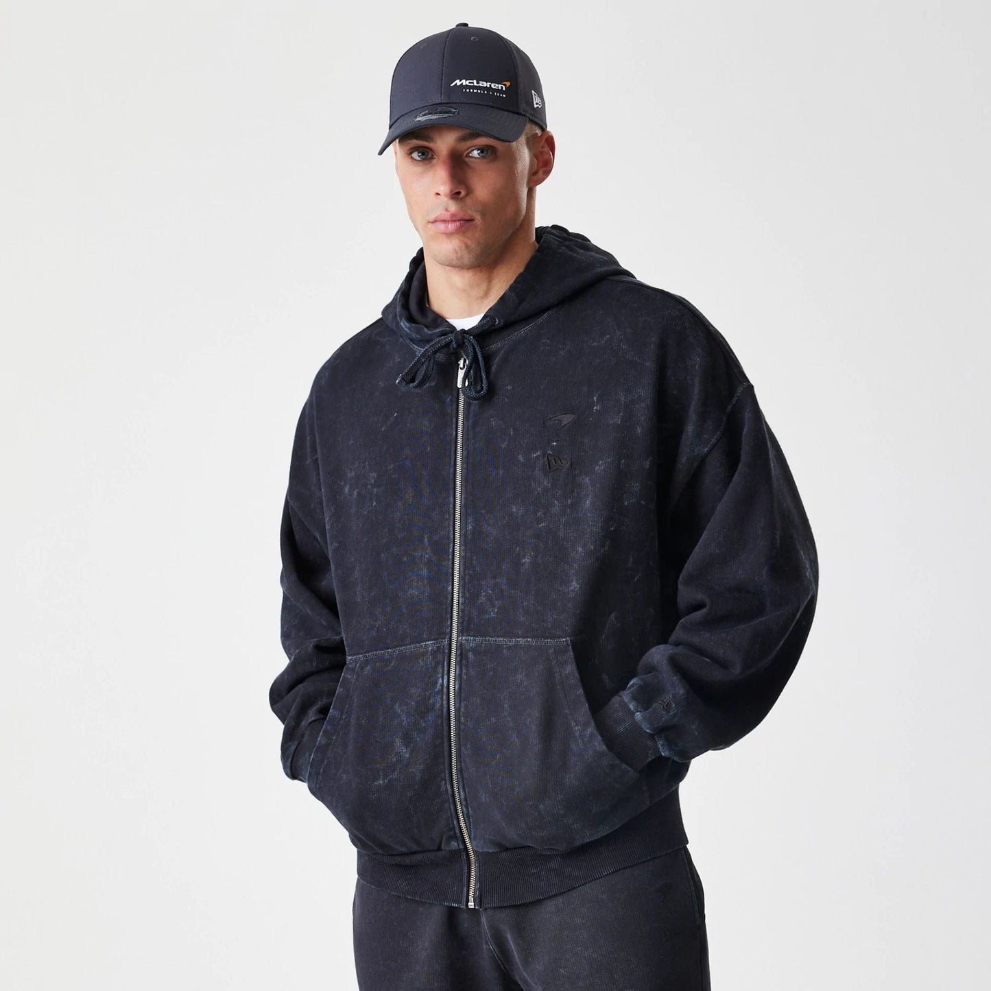 The Male model is wearing McLaren Racing Washed Black Oversized Full Zip Hoodie 9
