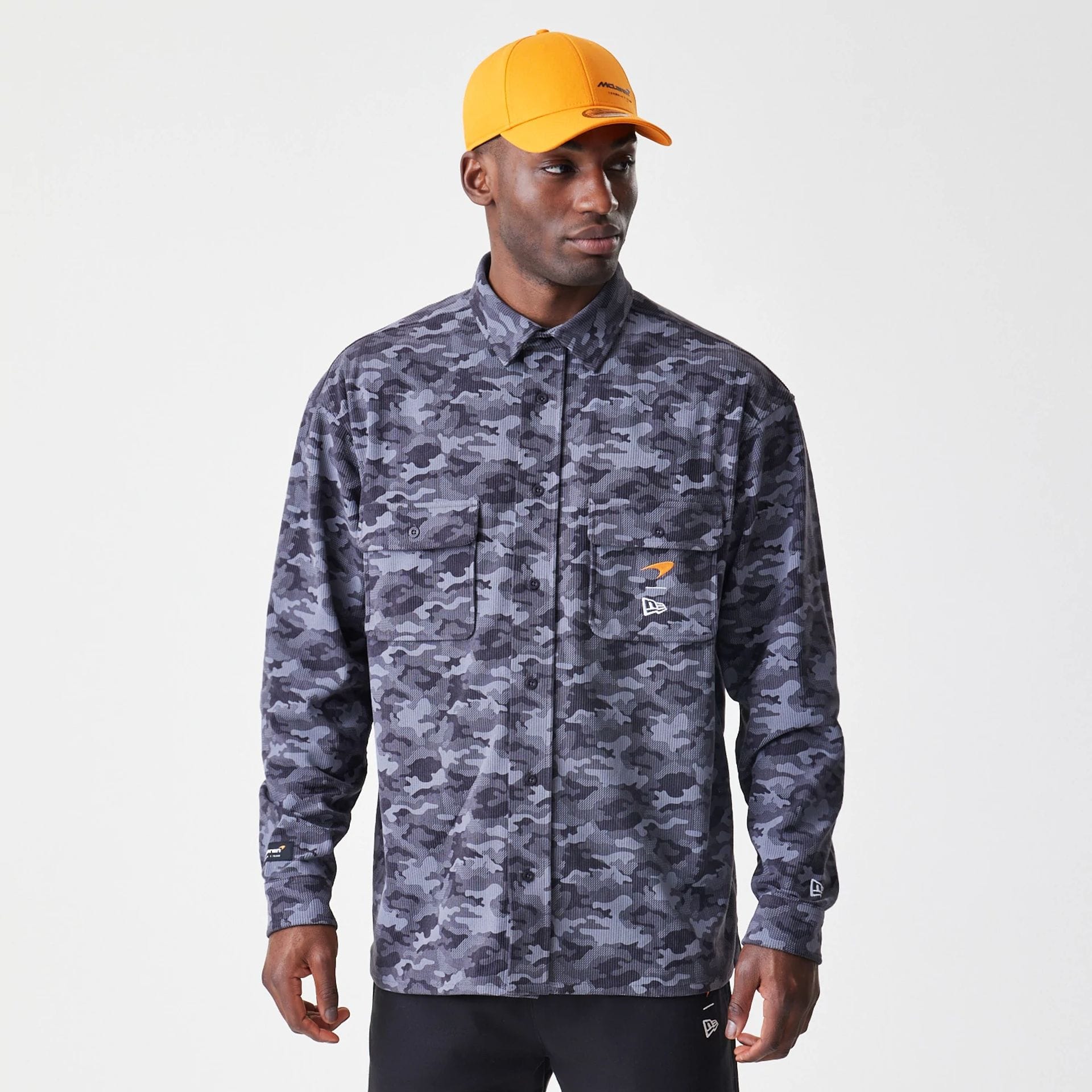 The Male model is wearing McLaren Racing Graphic Dark Grey Long Sleeve Shirt 1