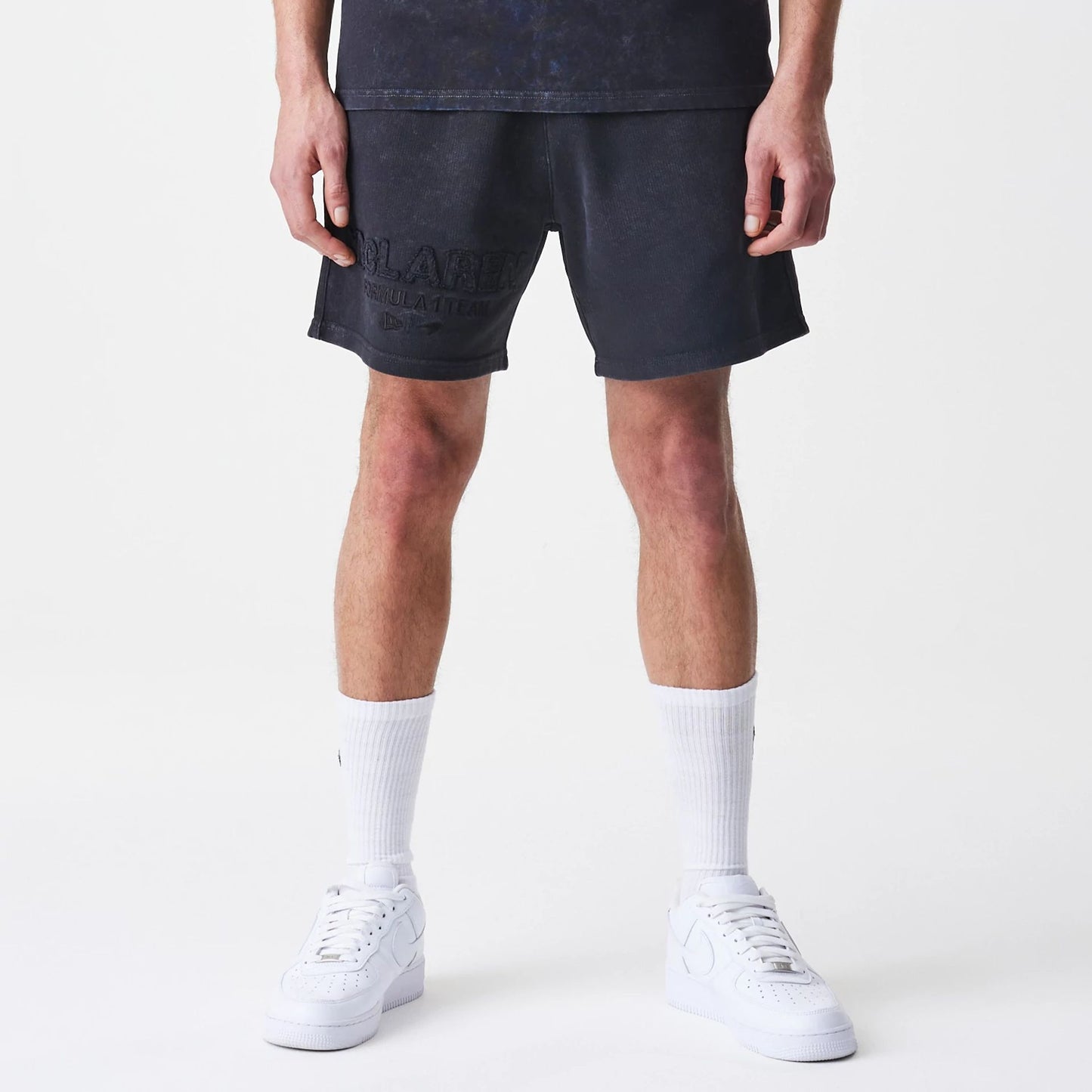 The Male model is wearing McLaren Racing Washed Black Shorts 9
