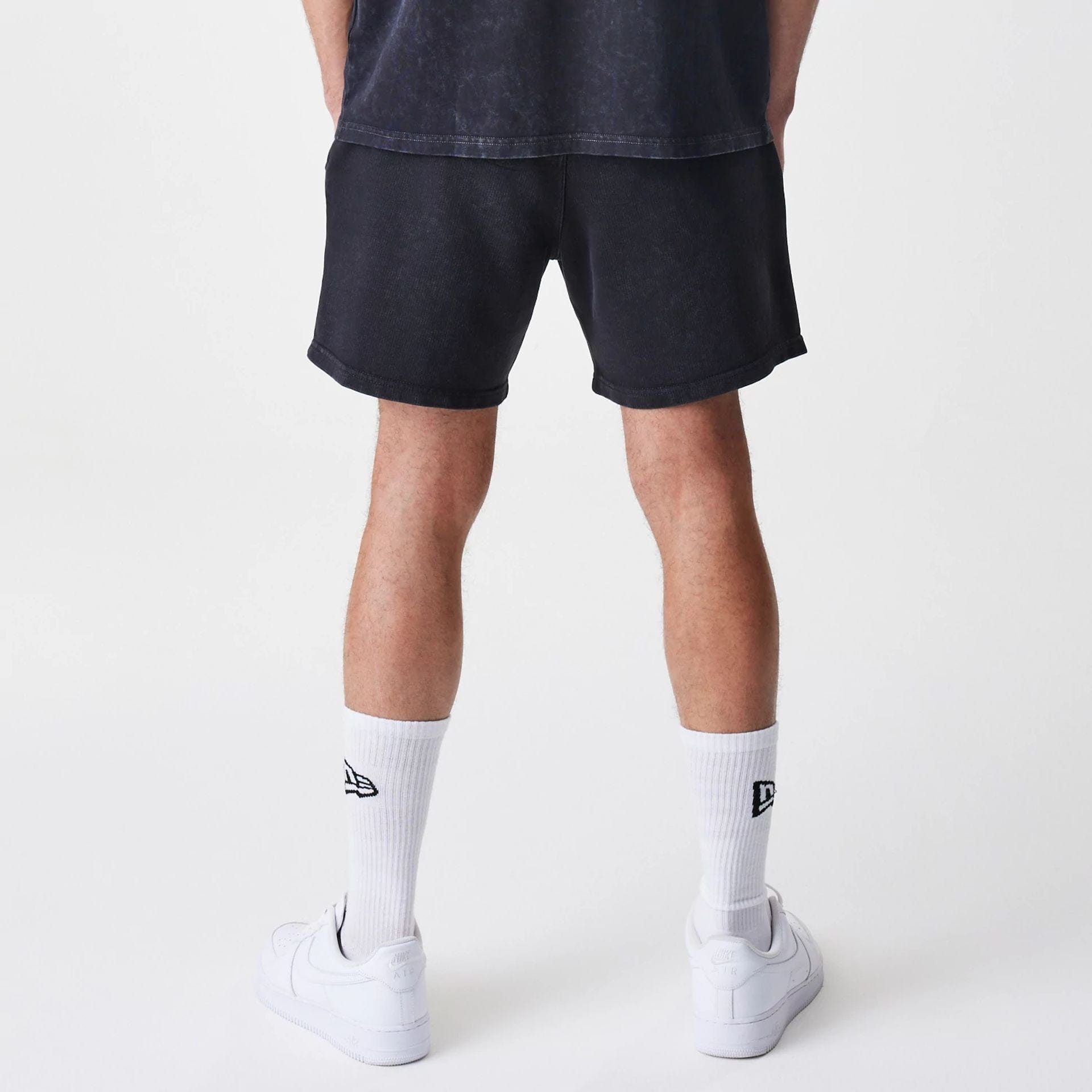 The Male model is wearing McLaren Racing Washed Black Shorts 2