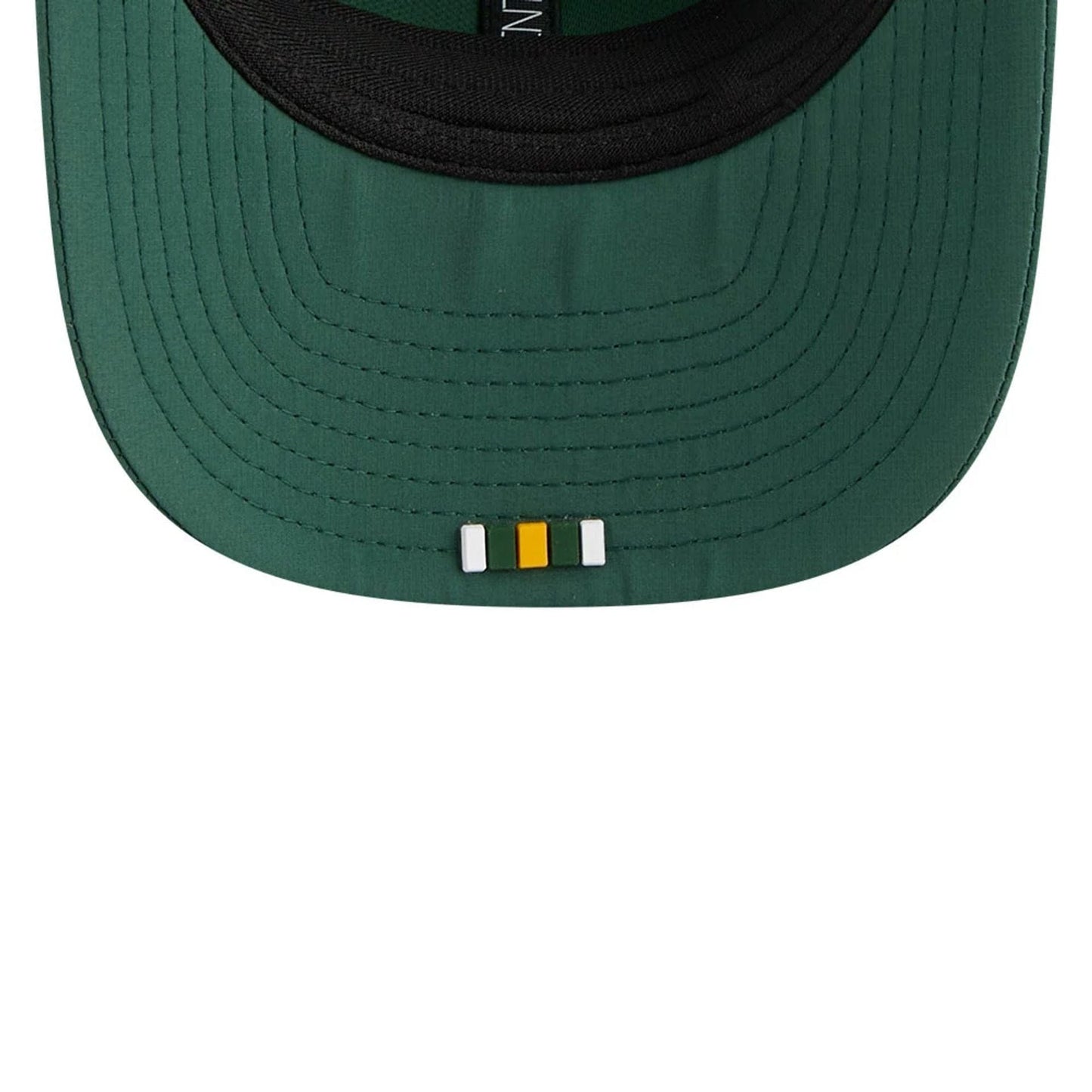 This is a Green Bay Packers NFL Sideline 2025 Dark Green 9SEVENTY Trucker Stretch Snap Adjustable Cap 7