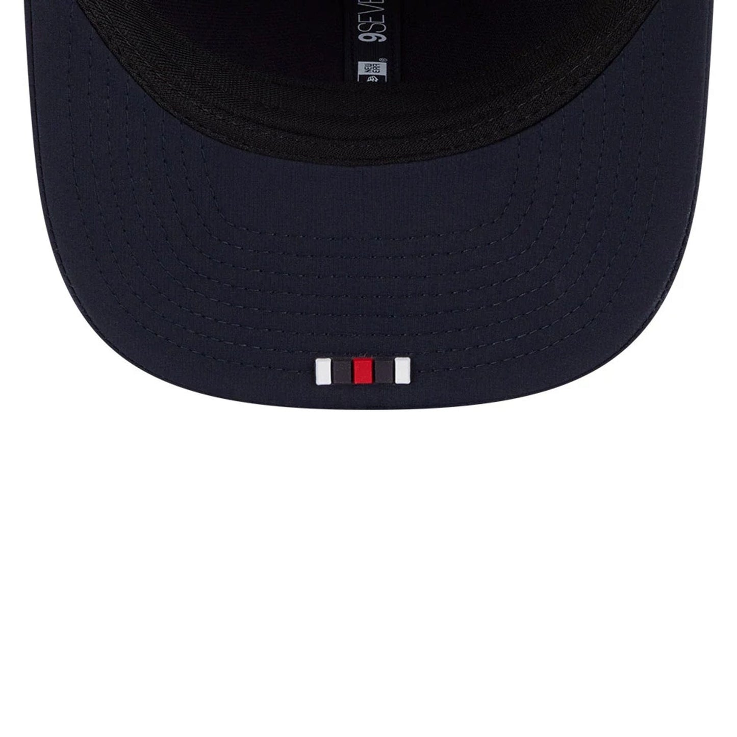 This is a Houston Texans NFL Sideline 2025 Navy 9SEVENTY Trucker Stretch Snap Adjustable Cap 7
