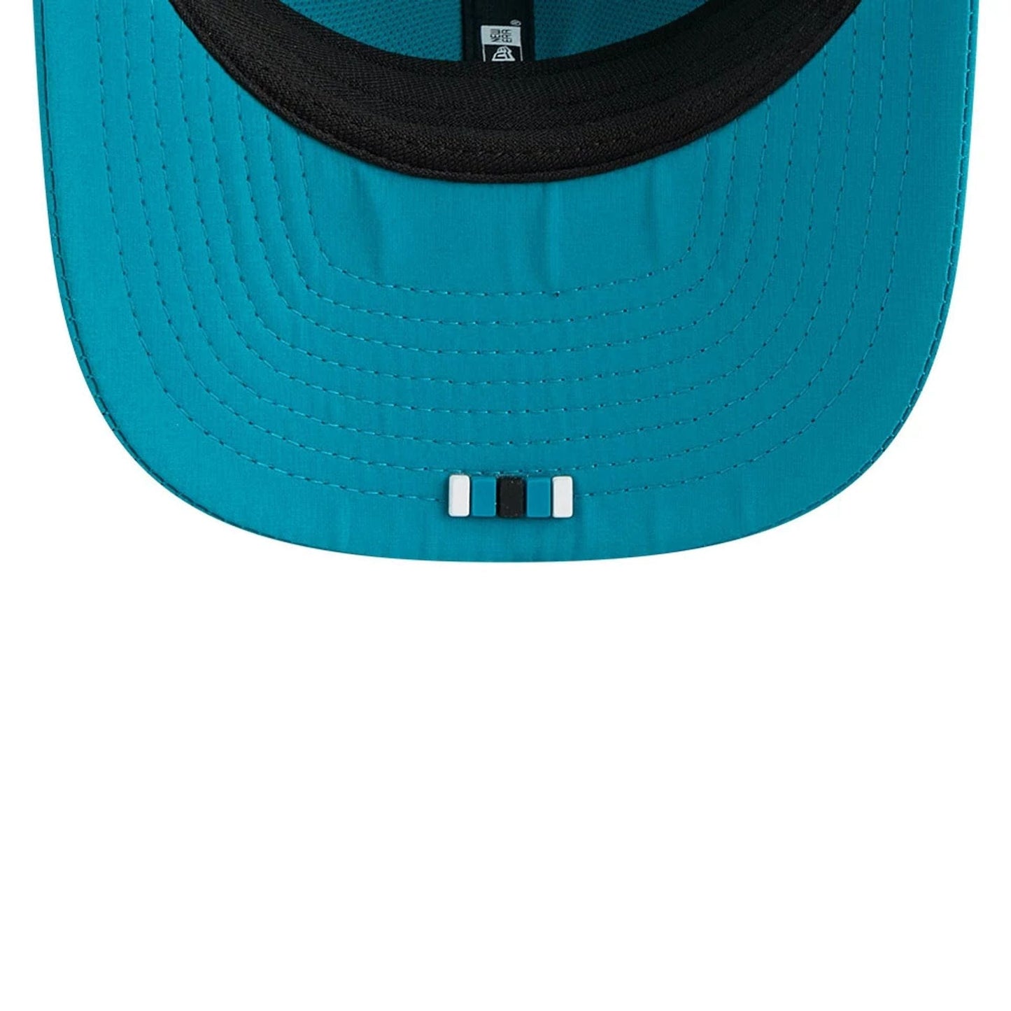 This is a Jacksonville Jaguars NFL Sideline 2025 Turquoise 9SEVENTY Trucker Stretch Snap Adjustable Cap 7