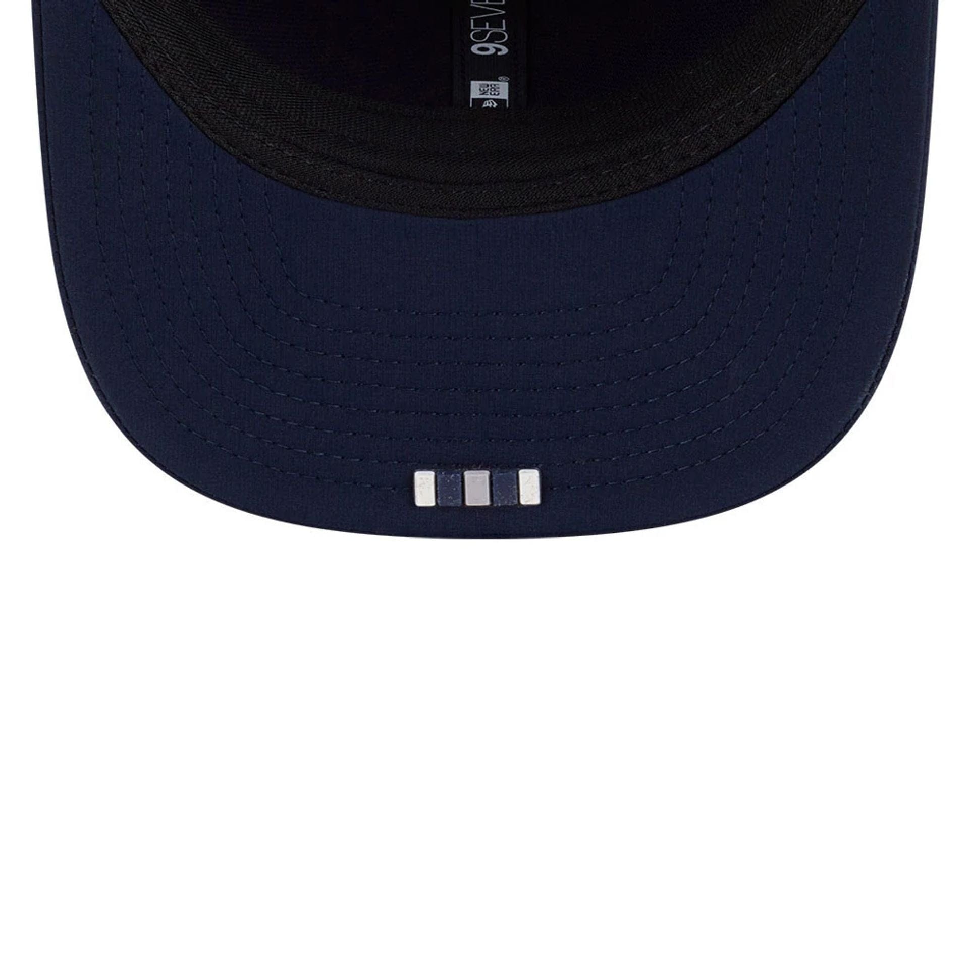 This is a Dallas Cowboys NFL Sideline 2025 Dark Blue 9SEVENTY Trucker Stretch Snap Adjustable Cap 2