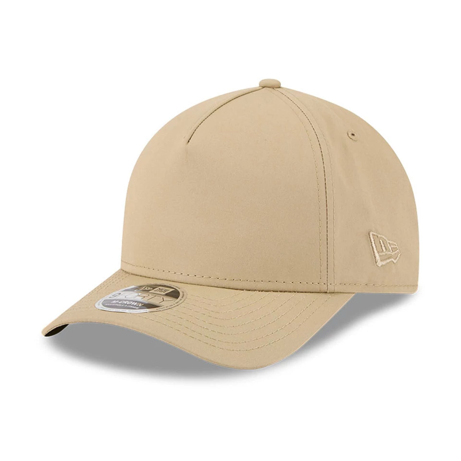This is a New Era Elevated Beige 9FORTY M-Crown A-Frame Adjustable Cap 1