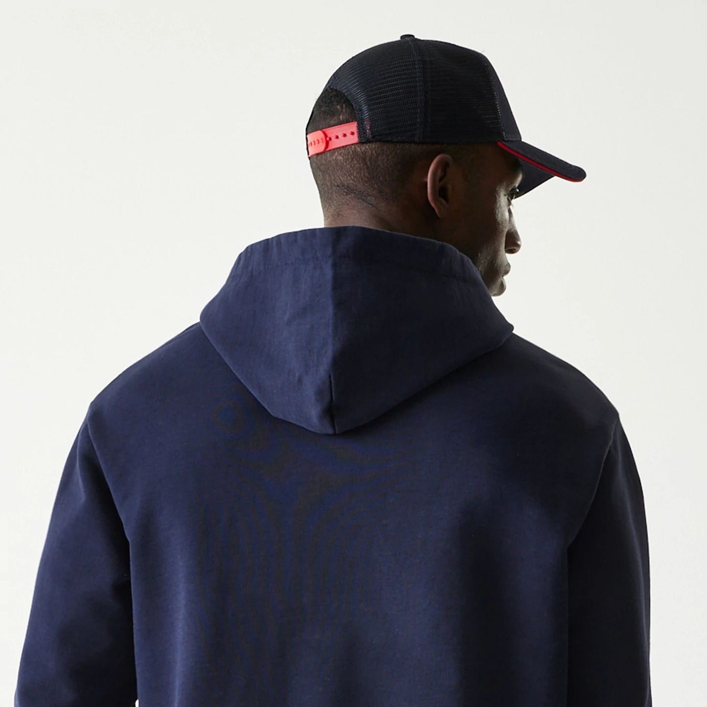 The Male model is wearing Red Bull Racing Dark Blue Oversized Full Zip Hoodie 7