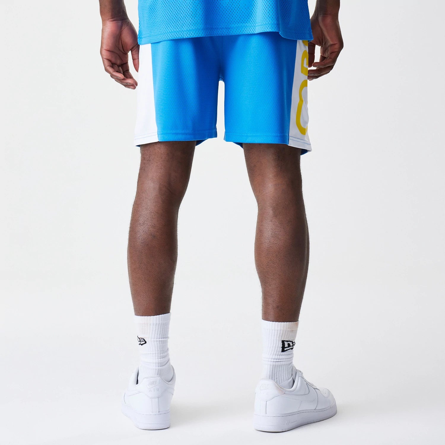The Male model is wearing Red Bull Racing Graphic Mesh Blue Shorts 2
