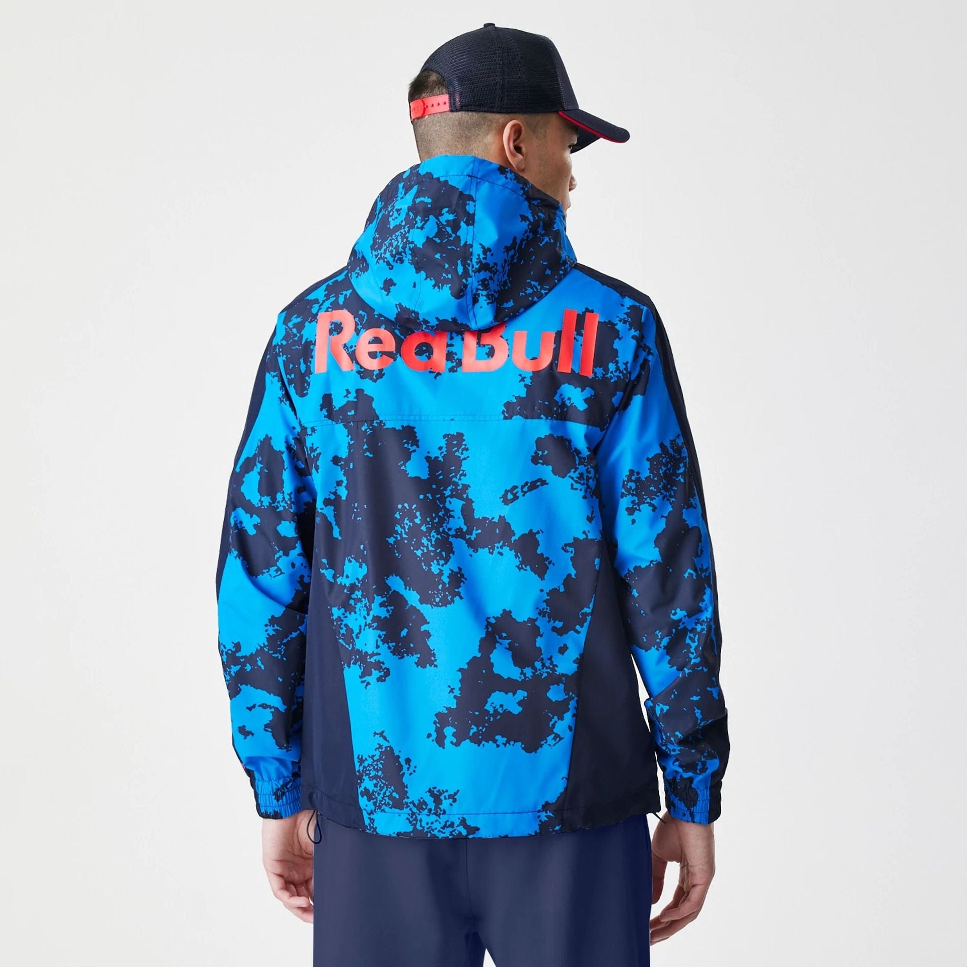 The Male model is wearing Red Bull Racing Blue Windrunner Jacket 2