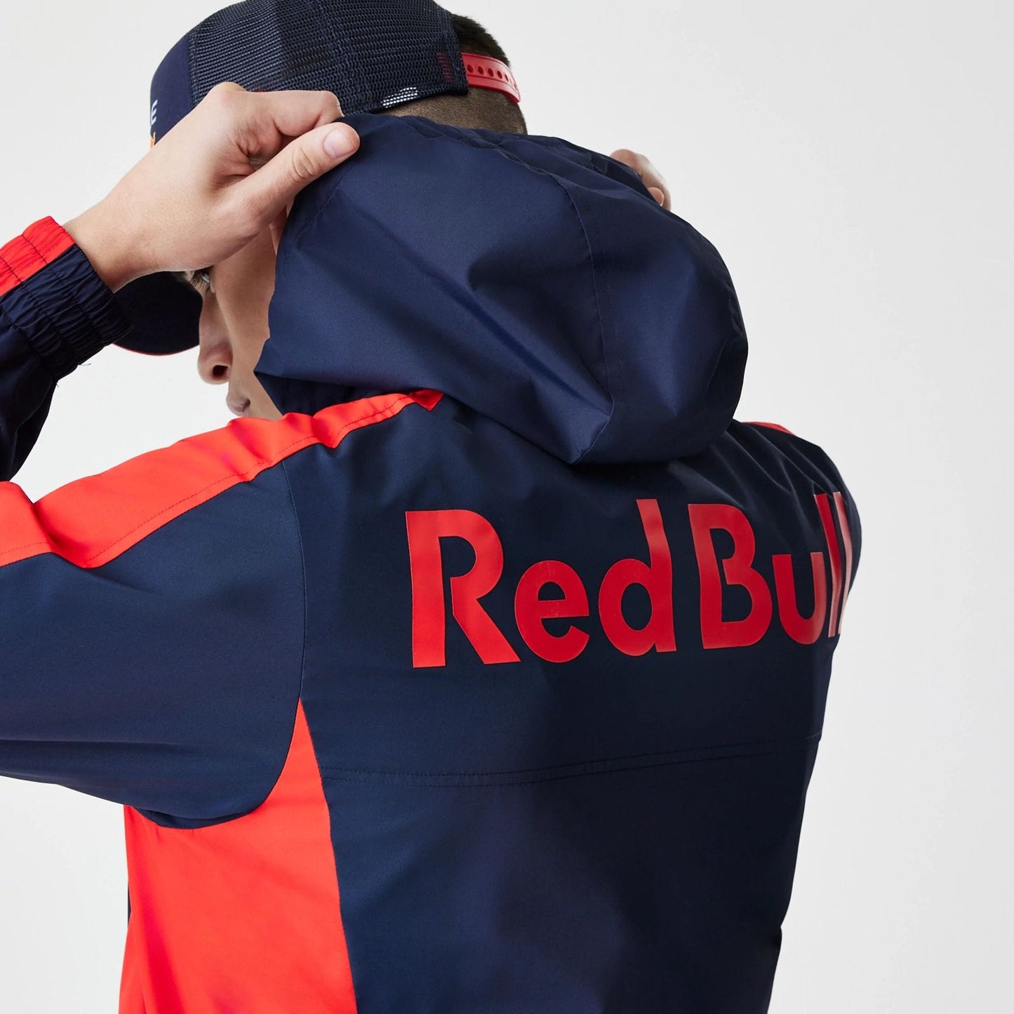 The Male model is wearing Red Bull Racing Dark Blue Windrunner Jacket 7
